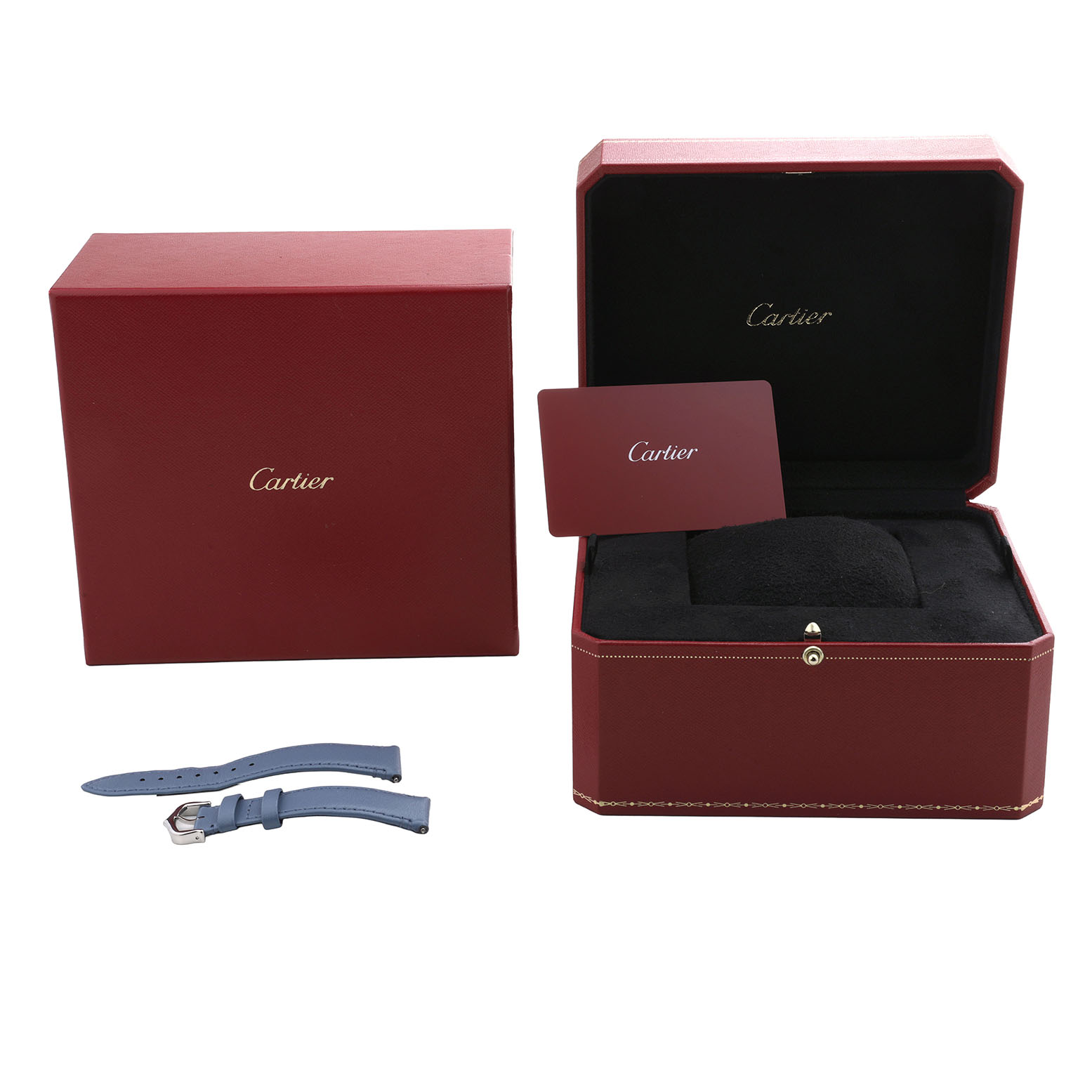The image shows Cartier's Tank Must packaging with a box, card, and blue watch straps.