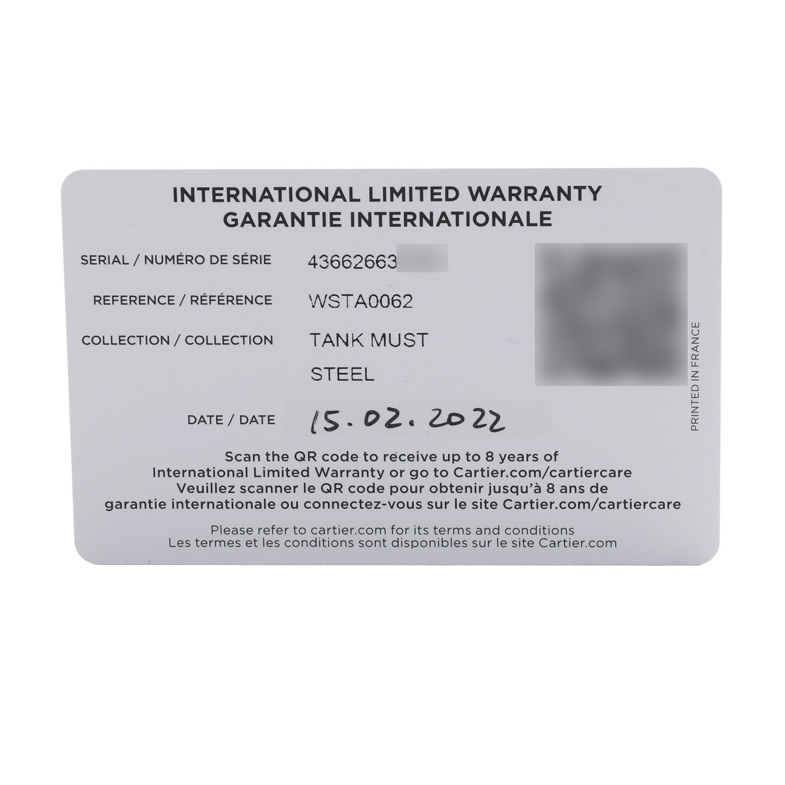 This image shows the international warranty card for the Cartier Tank Must WSTA0062 Women's Stainless Steel Silver Dial watch model.