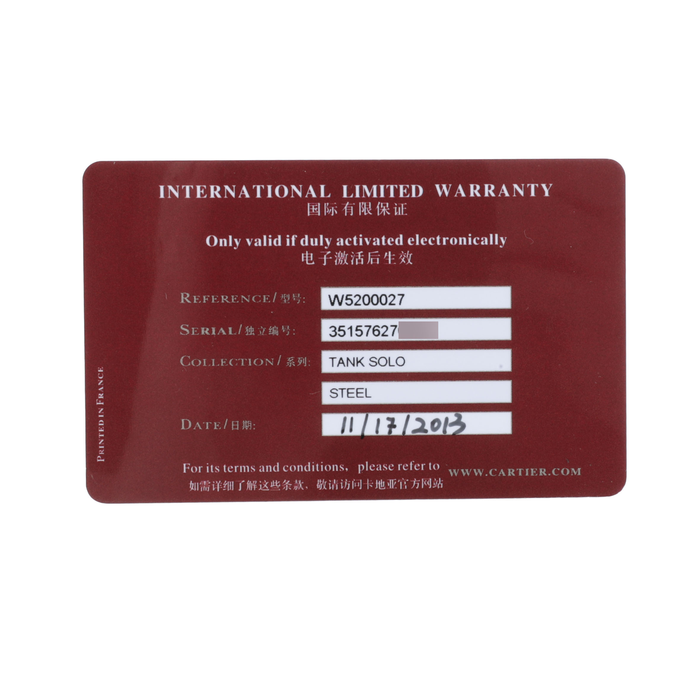The image shows a Cartier Tank Solo 84588 Men's Stainless Steel Silver Dial International Limited Warranty card with details like reference and serial number.