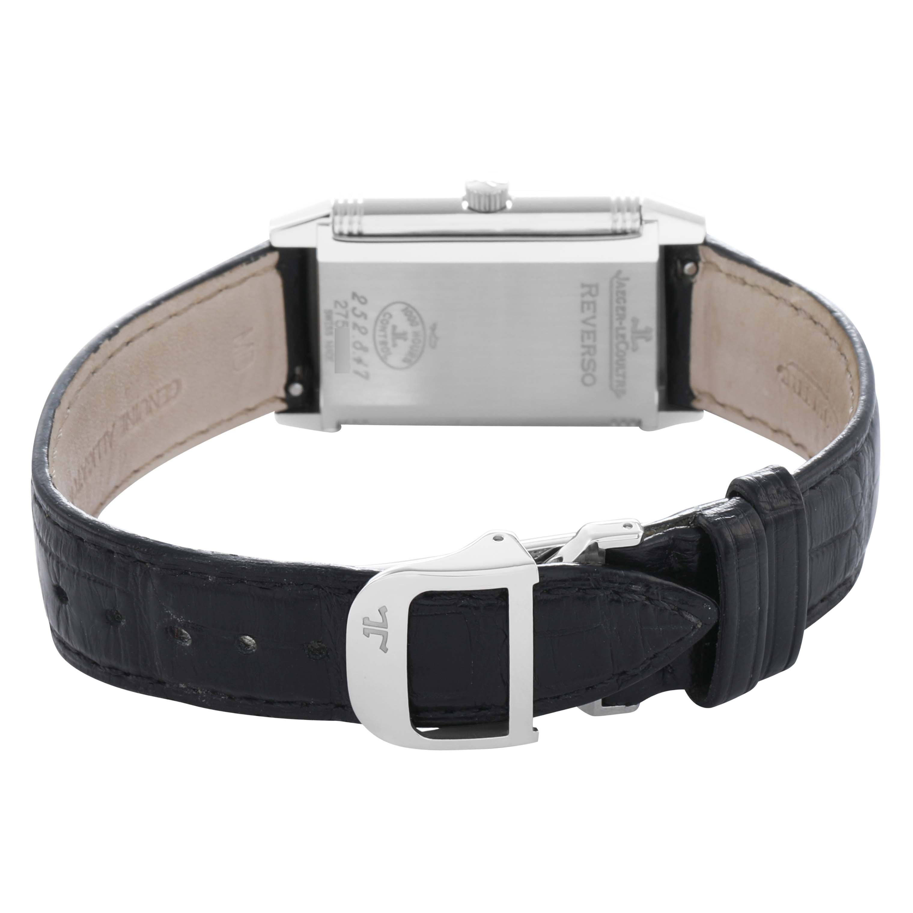 The Jaeger-LeCoultre Reverso watch is shown from the back, featuring the case back, strap, and clasp.