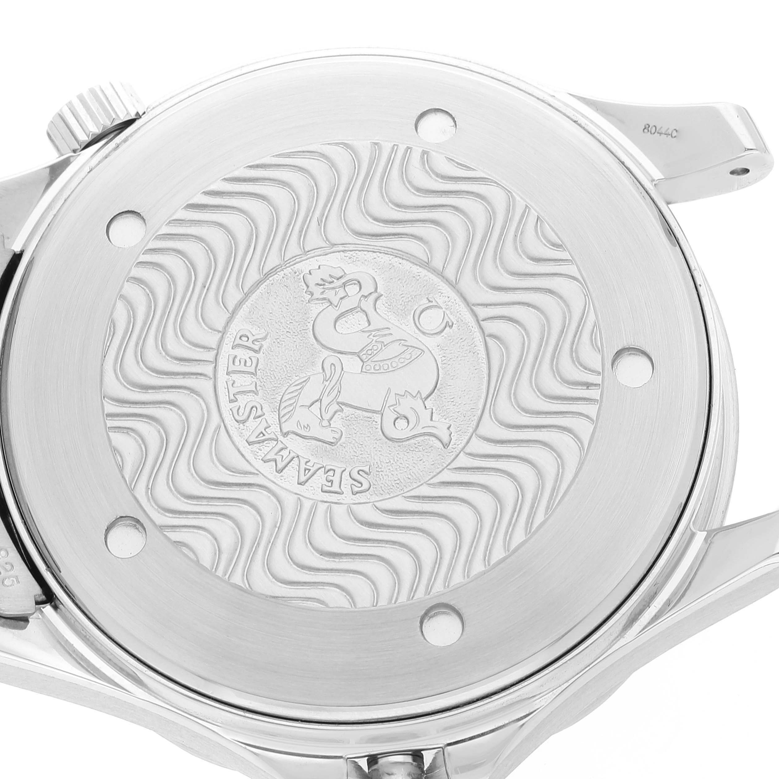 The image displays the case back and crown of an Omega Seamaster 2531.80.00 Men's Stainless Steel Blue Dial 2531.80.00 Men's Stainless Steel Blue Dial watch, showcasing its signature engravings and wavy pattern.