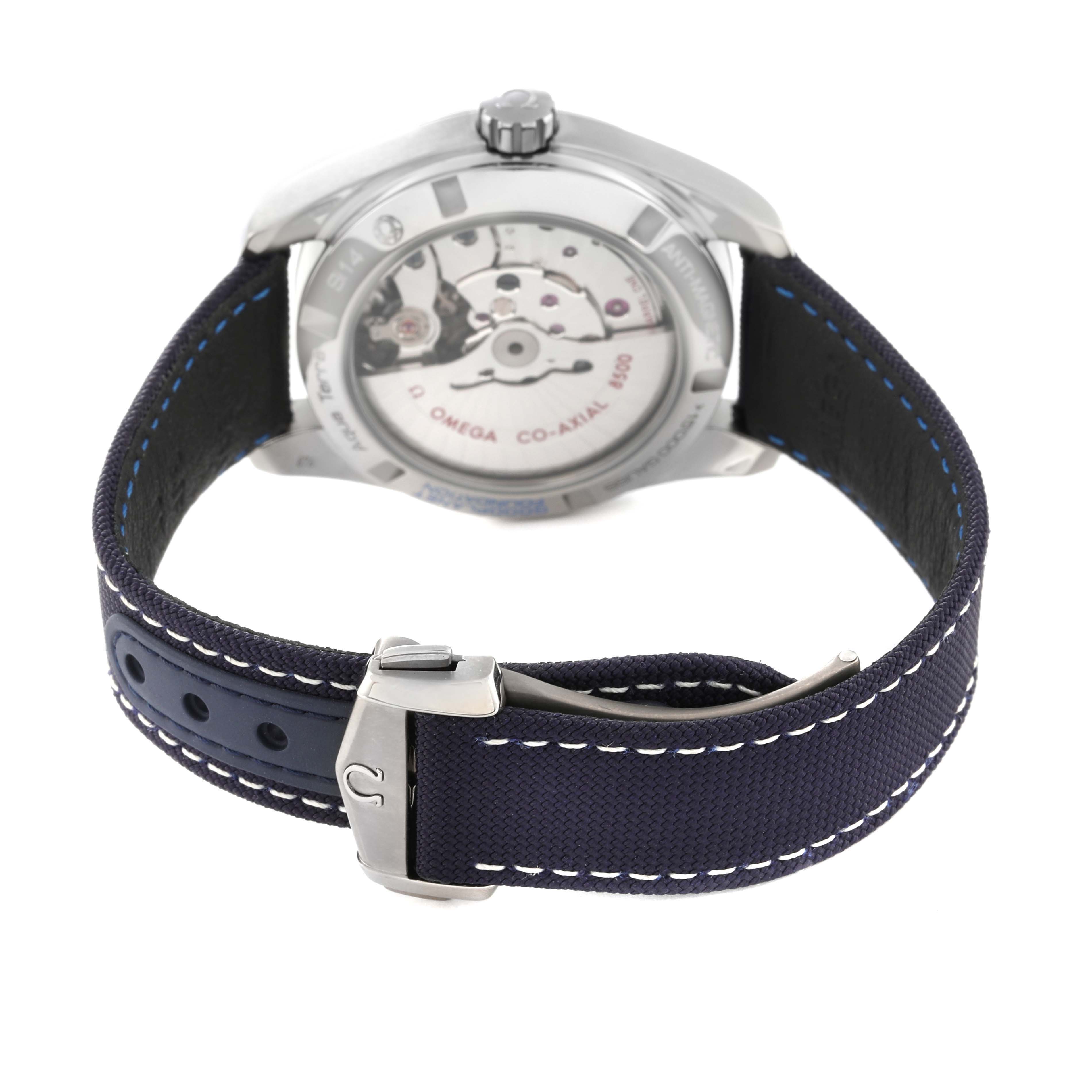 The image shows the rear view of an Omega Aqua Terra 231.92.39.21.04.001 Men's Titanium White Dial 231.92.39.21.04.001 Men's Titanium White Dial watch, highlighting its transparent case back and navy blue strap with stitching.