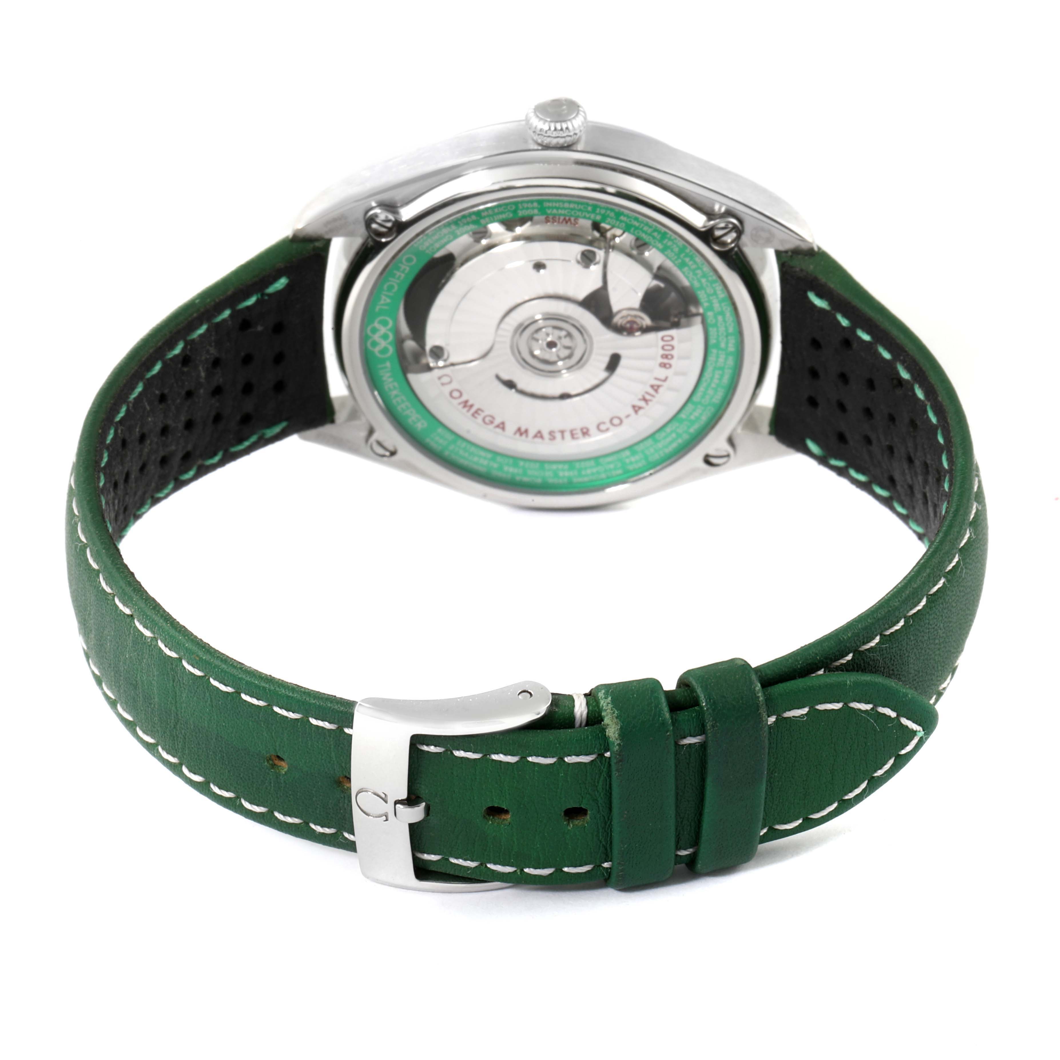 The image shows the back view of an Omega Seamaster 522.32.40.20.01.005 Men's Stainless Steel Black Dial 522.32.40.20.01.005 Men's Stainless Steel Black Dial watch, highlighting its transparent case back and green leather strap with a buckle.