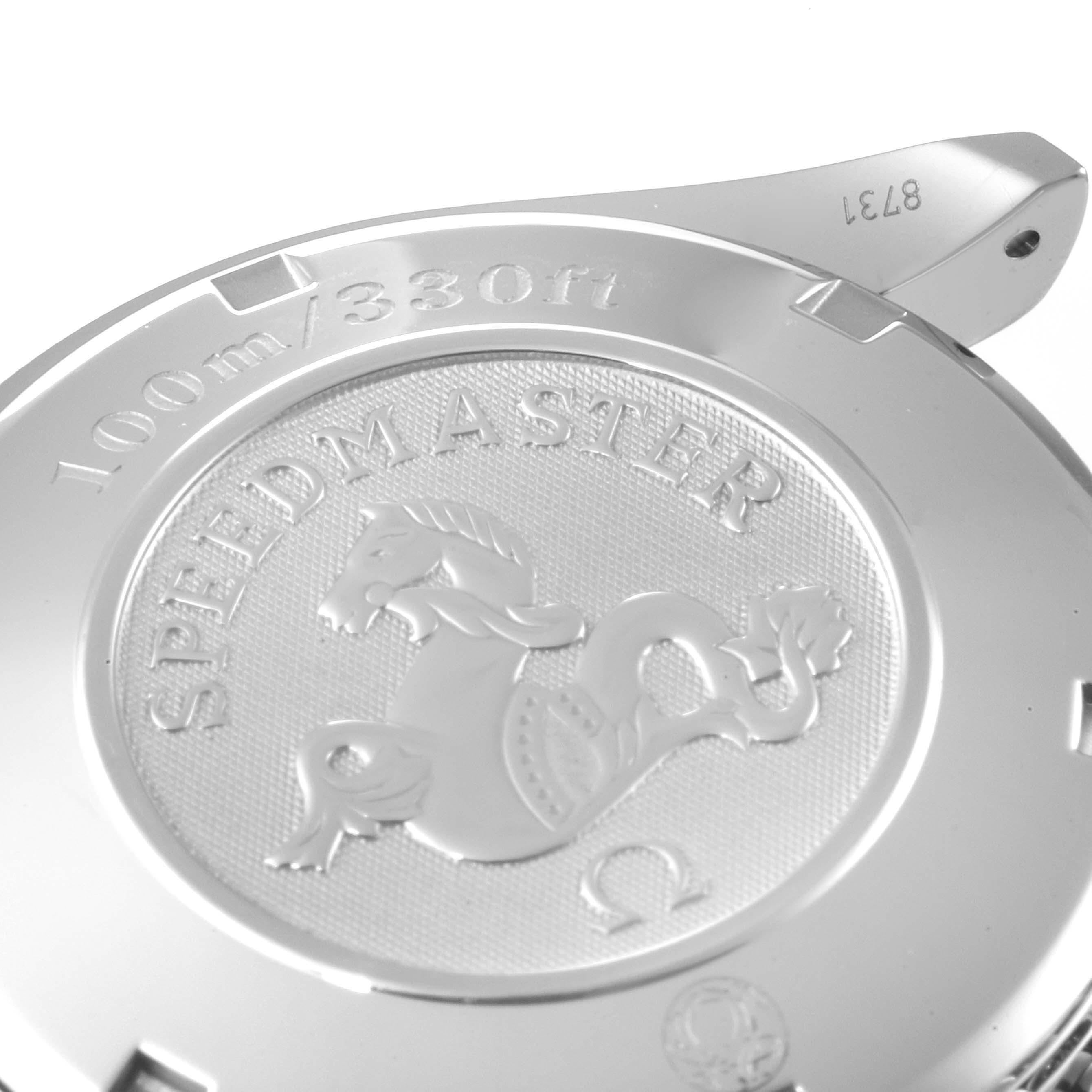 The image shows the case back of an Omega Speedmaster 323.30.40.40.06.001 Men's Stainless Steel Grey Dial 323.30.40.40.06.001 Men's Stainless Steel Grey Dial watch, emphasizing the engraved logo and water resistance details.