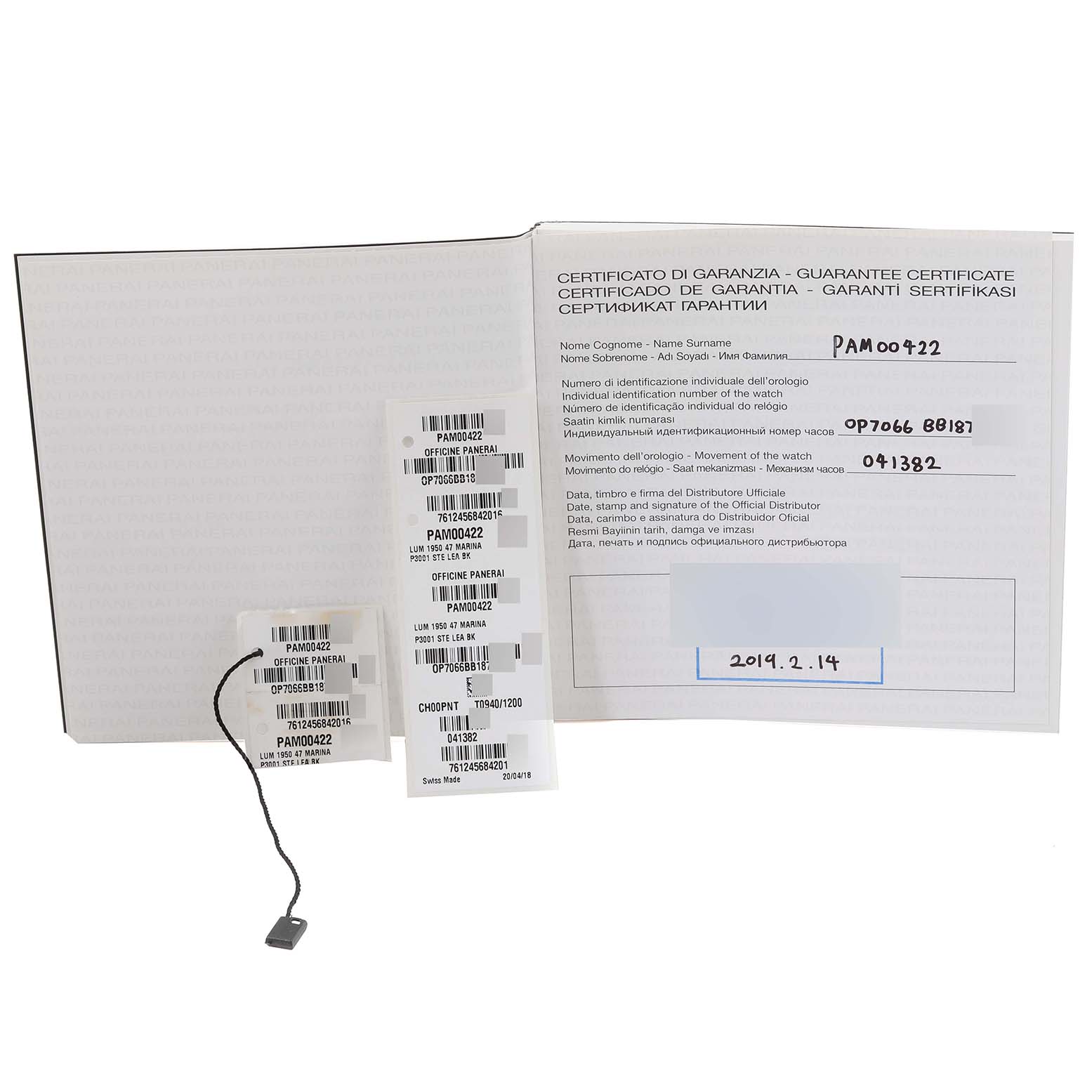 This image shows warranty cards and tags for a Panerai Luminor PAM00422 Men
s Stainless Steel Black Dial PAM00422 Men
s Stainless Steel Black Dial model PAM00422 watch.