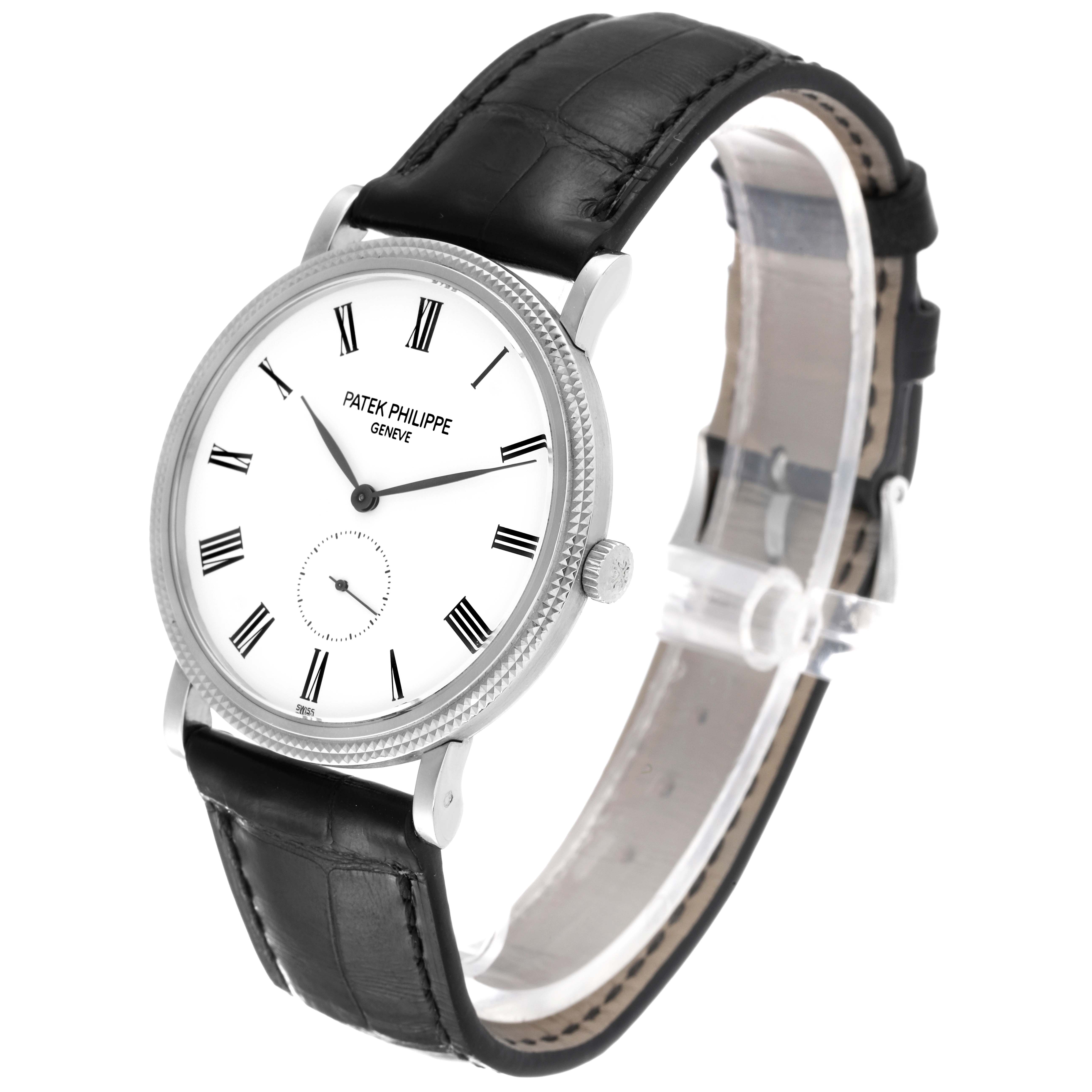 The image shows a side-angle view of the Patek Philippe Calatrava 5119G Men's White Gold White Dial 5119G Men's White Gold White Dial watch, highlighting its dial, case, crown, and leather strap.