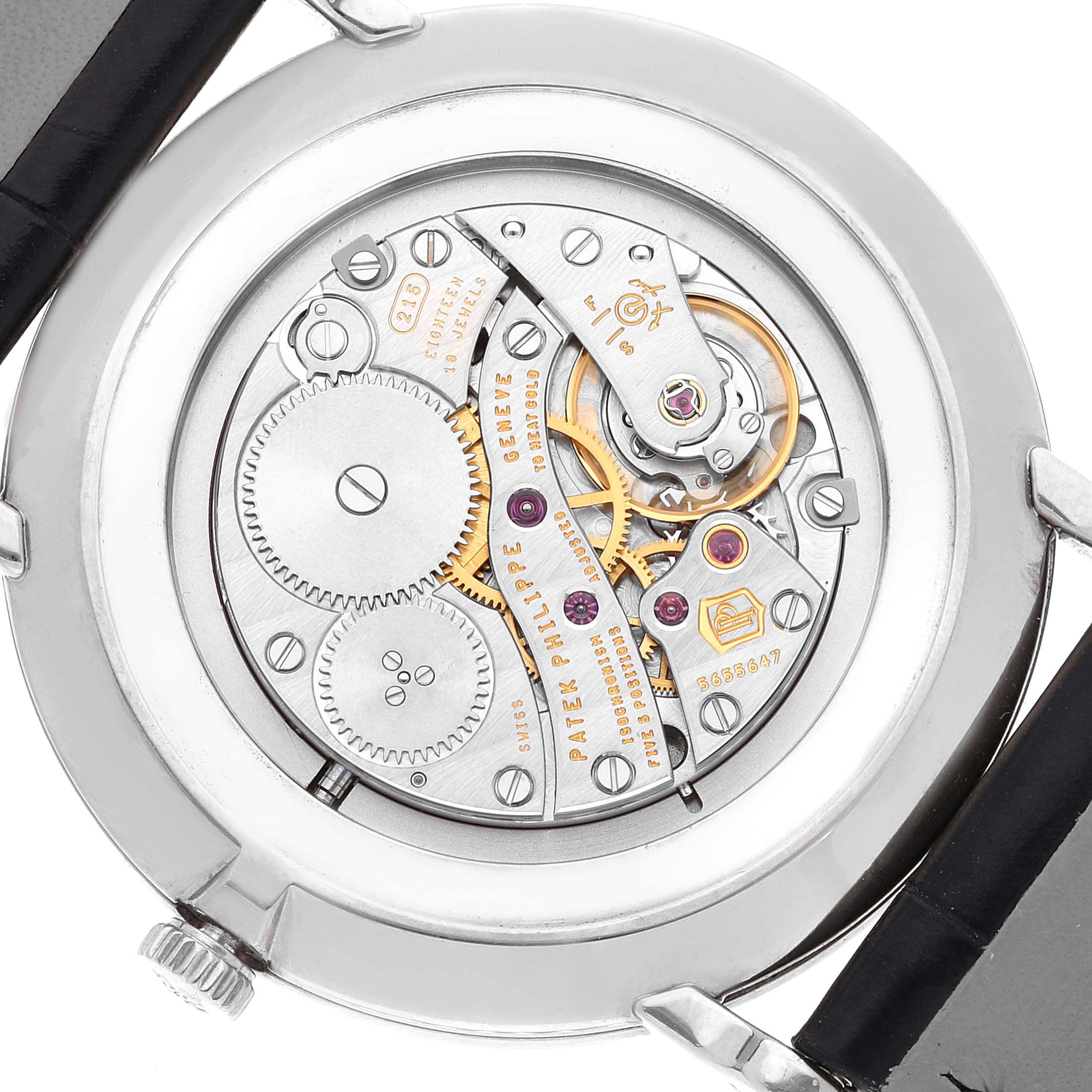 This image shows the back view of a Patek Philippe Calatrava 5119G Men's White Gold White Dial 5119G Men's White Gold White Dial watch, revealing its intricate mechanical movement and components.