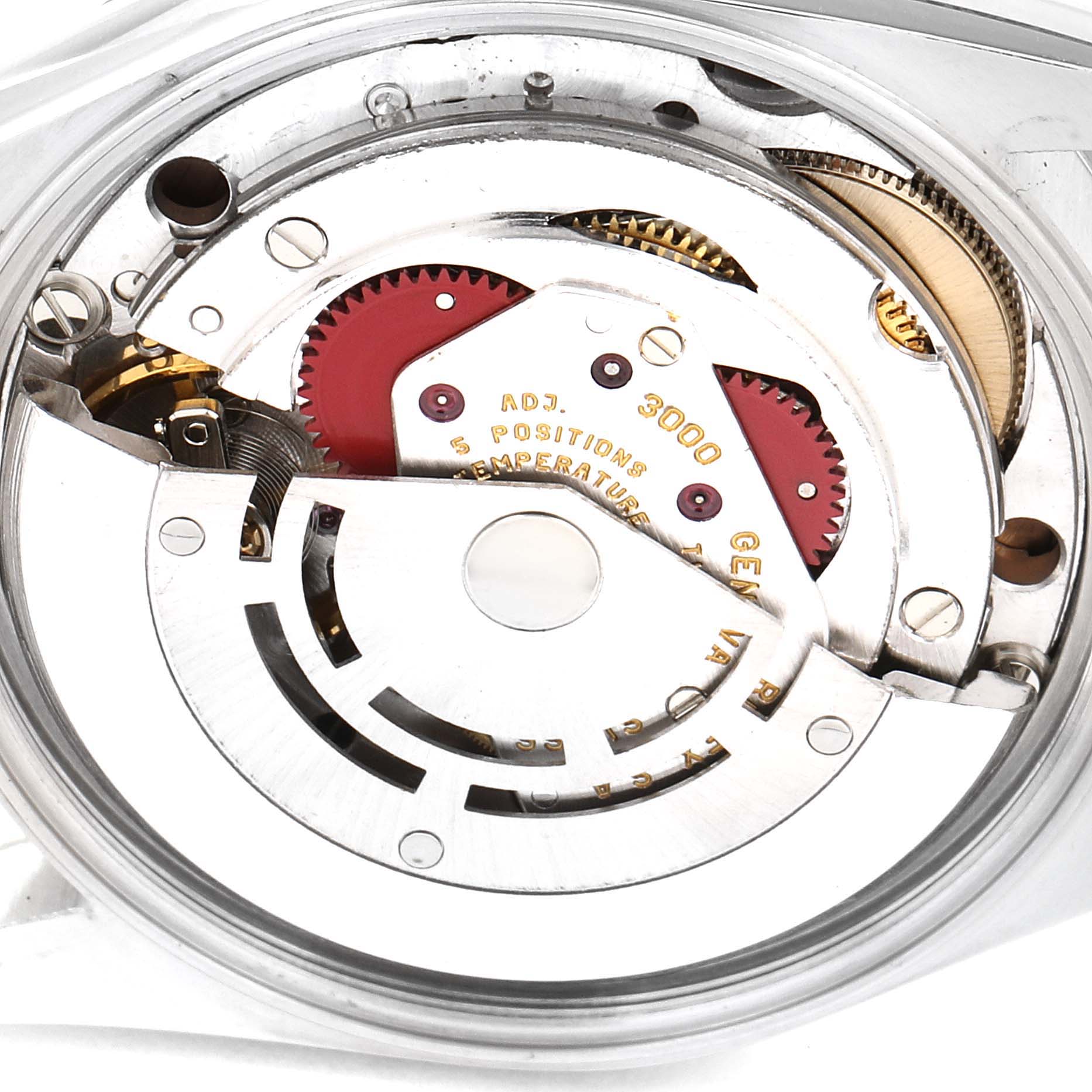 This image shows a close-up of the internal mechanism of a Rolex Air-King 14000 Men's Stainless Steel Pink Dial 14000 Men's Stainless Steel Pink Dial watch, revealing its intricate components and gears.