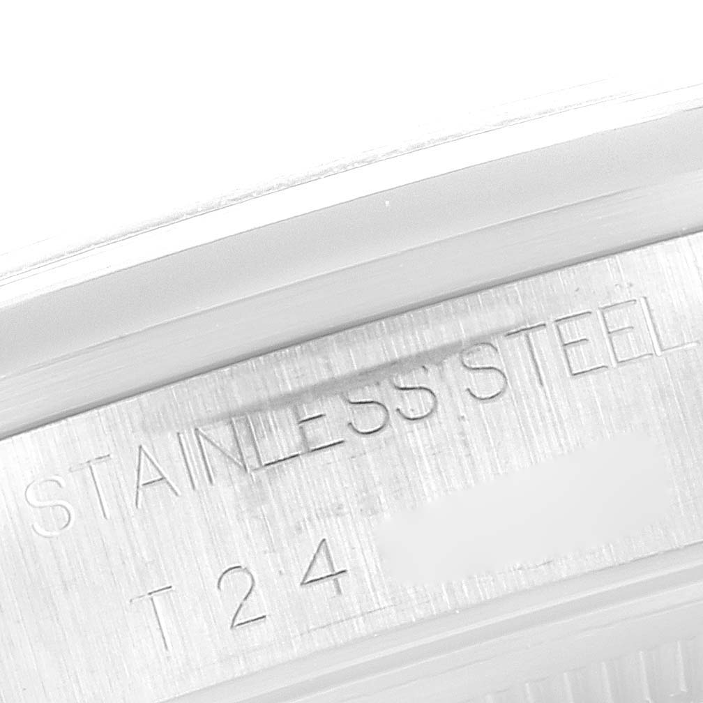 The image shows a close-up angle of the stainless steel casing with engravings on the Rolex Air-King 14000 Men's Stainless Steel Pink Dial 14000 Men's Stainless Steel Pink Dial watch.