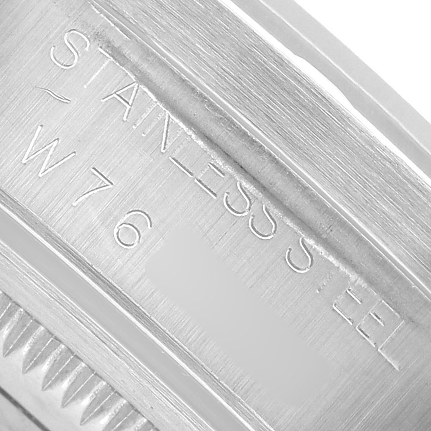 The image shows a close-up of the stainless steel case back of a Rolex Air-King 14010 Men's Stainless Steel White Dial watch.