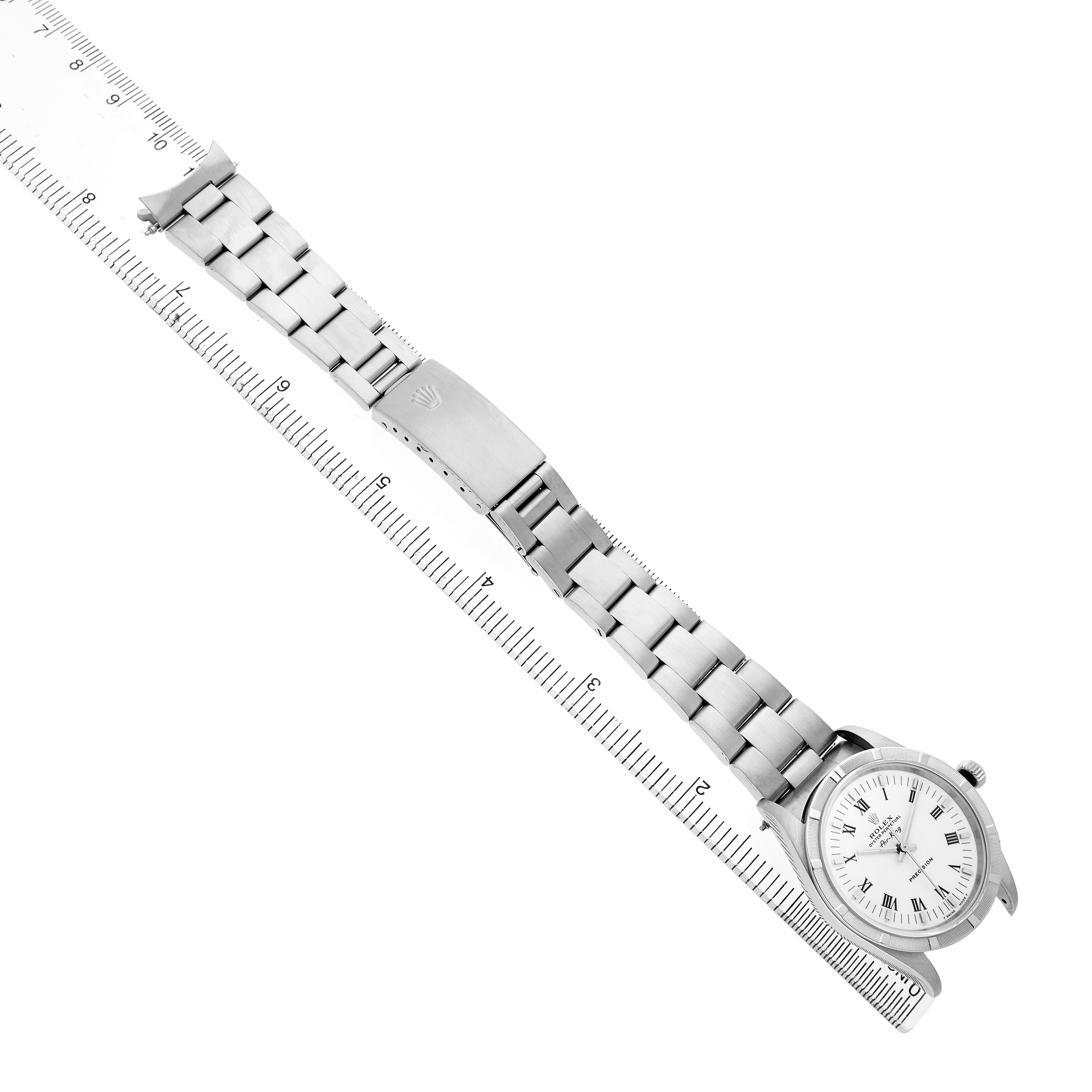 The Rolex Air-King 14010 Men's Stainless Steel White Dial watch is shown from a top-down angle, highlighting the bracelet, clasp, and silver watch face.