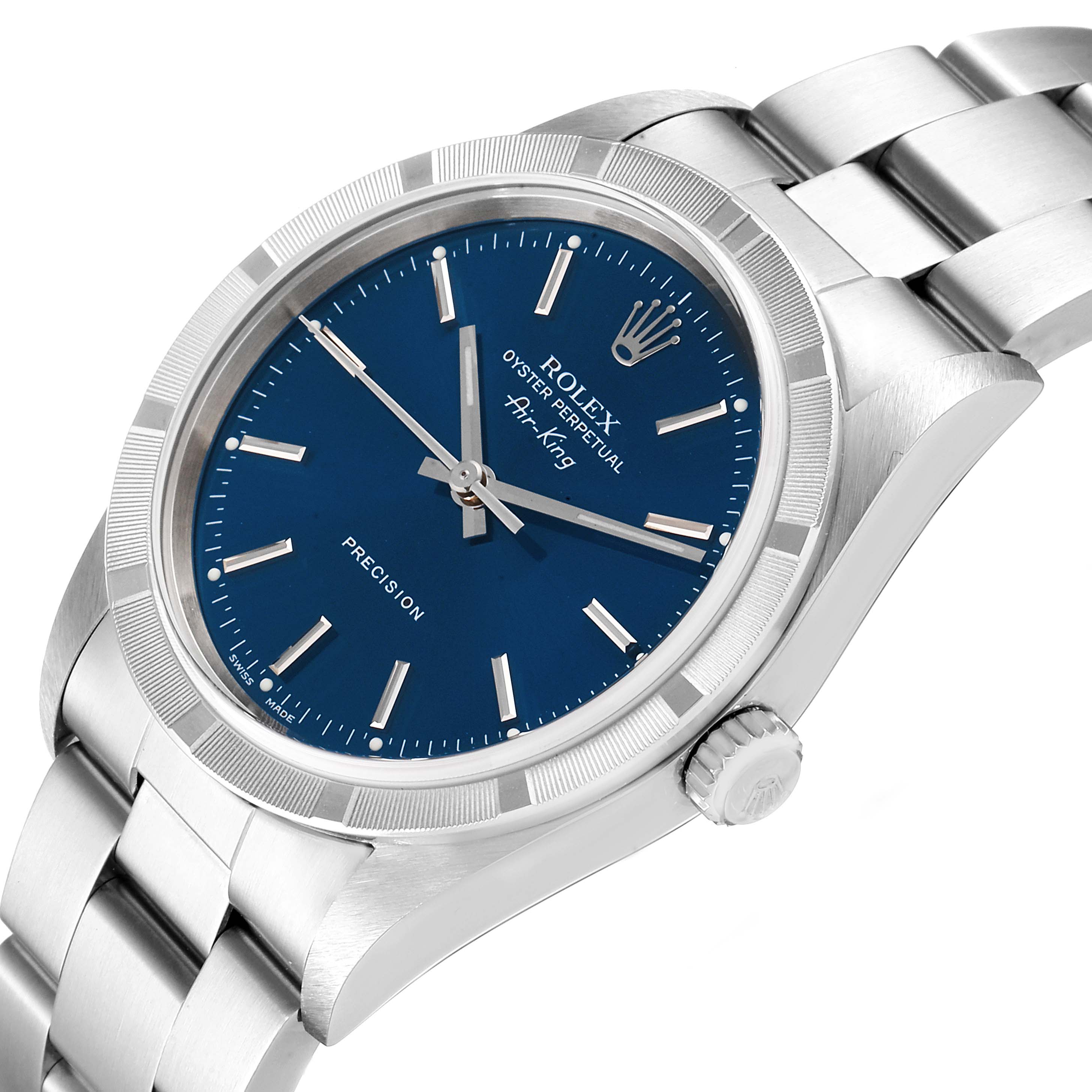 The image shows a Rolex Air-King 14010 Men's Stainless Steel Blue Dial 14010 Men's Stainless Steel Blue Dial watch at an angled view, highlighting its blue dial, bezel, crown, and a part of its bracelet.