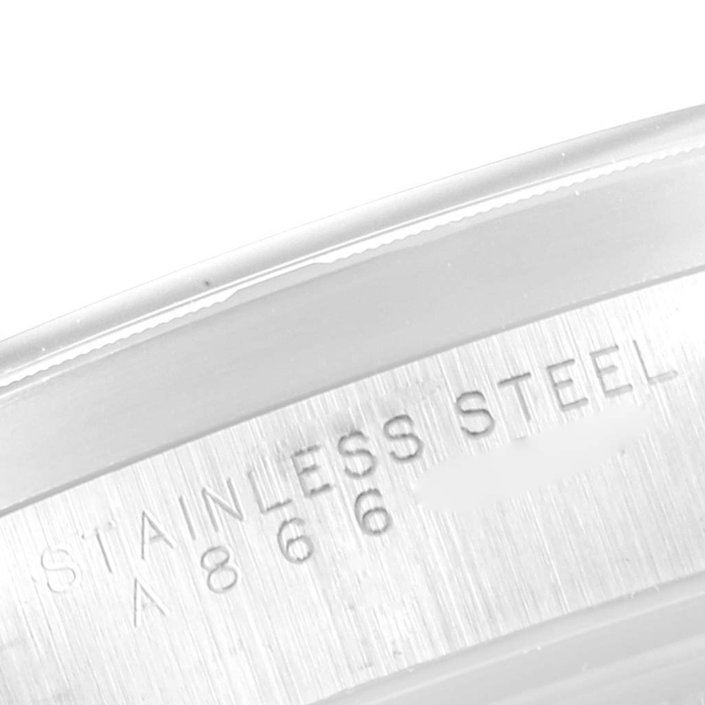 This image shows a close-up view of the stainless steel casing and engraving on a Rolex Air-King 14010 Men's Stainless Steel Blue Dial 14010 Men's Stainless Steel Blue Dial watch.