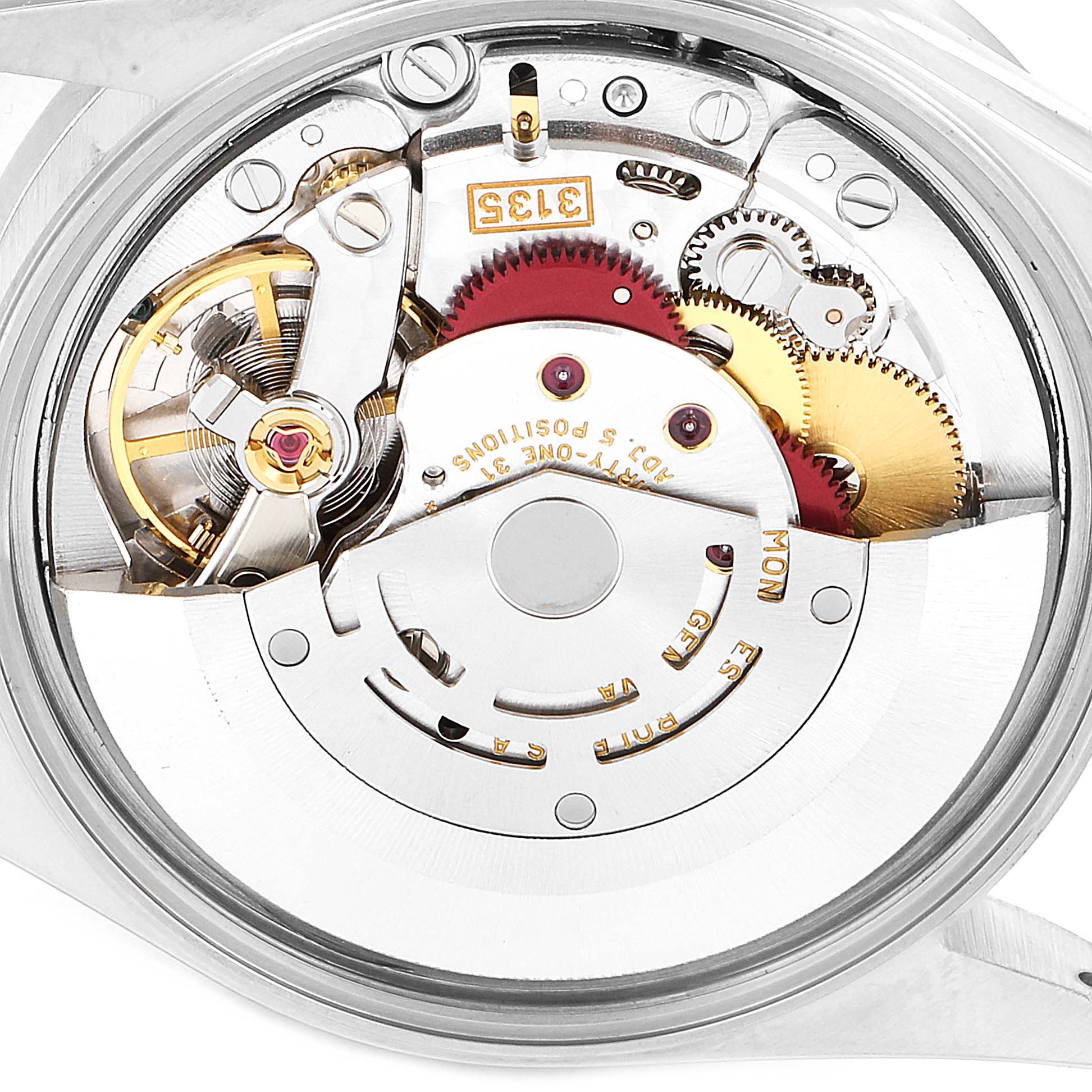 The image shows the movement and internal mechanical parts of a Rolex Date 15210 Men's Stainless Steel Blue Dial 15210 Men's Stainless Steel Blue Dial model watch from a top-down angle.