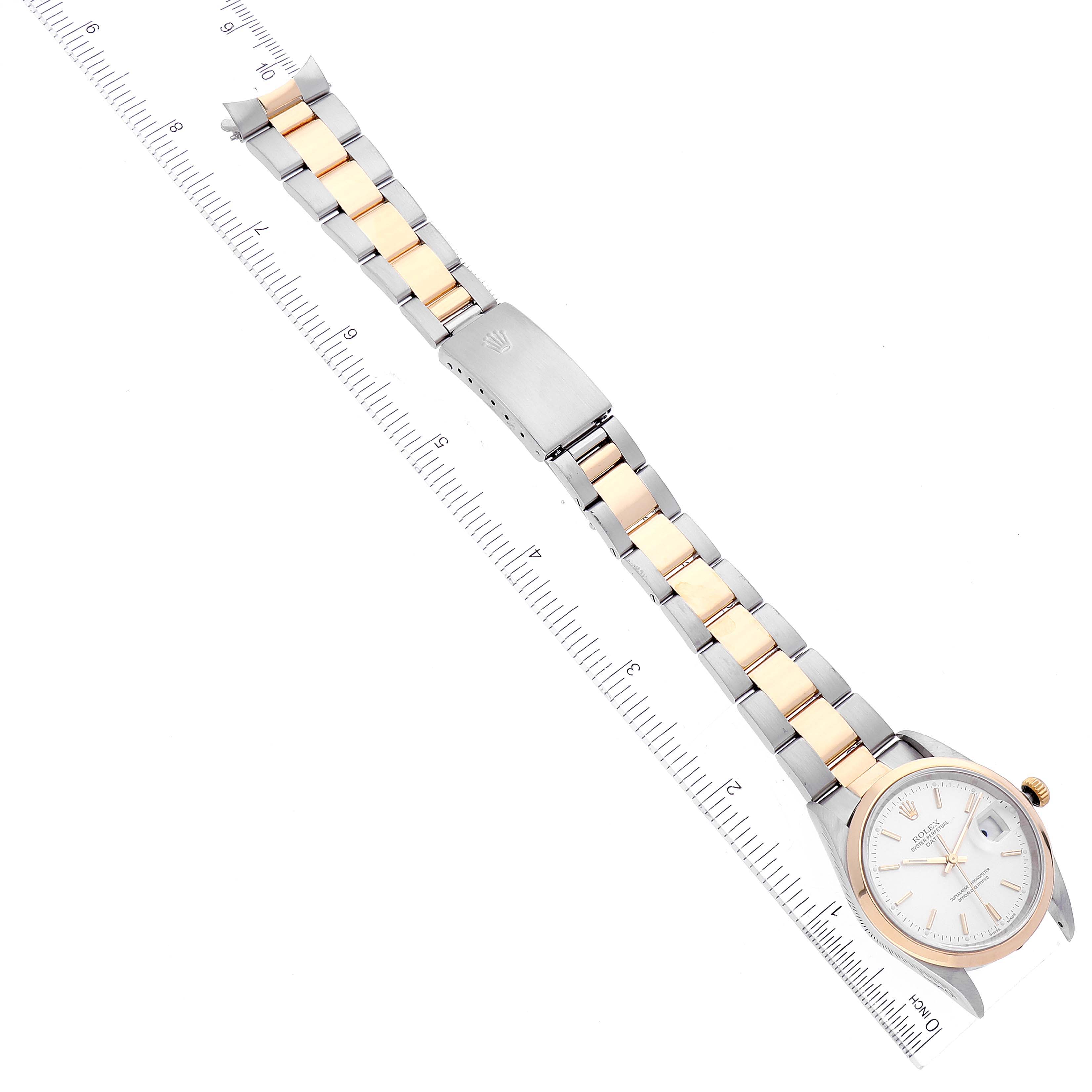 This image shows a top-down view of a Rolex Date 15203 Men
s Steel and Gold (two tone) Silver Dial 15203 Men
s Steel and Gold (two tone) Silver Dial model, highlighting the face, bezel, and two-tone bracelet with a clasp.