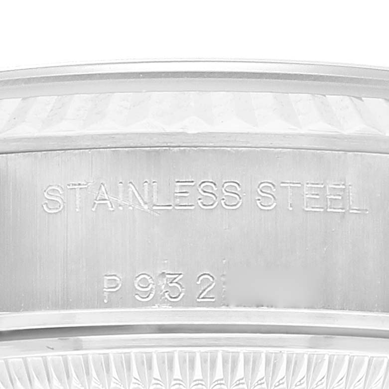 This close-up image shows the stainless steel engravings on the side of the Rolex Datejust 79174 Women
s Stainless Steel Black Dial 79174 Women
s Stainless Steel Black Dial watch case.