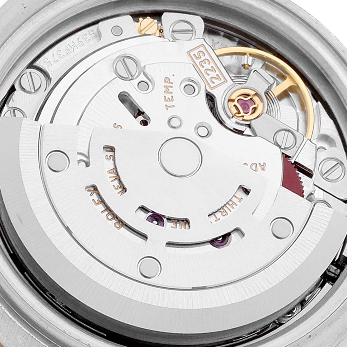 This is a close-up image of the movement mechanism inside a Rolex Datejust 179173 Women's Steel and Gold (two tone) Silver Dial 179173 Women's Steel and Gold (two tone) Silver Dial watch.