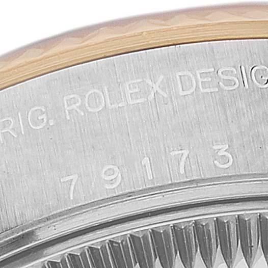 This image shows a close-up of the case back edge with model number 79173 of a Rolex Datejust 79173 Women
s Steel and Gold (two tone) Grey Dial 79173 Women
s Steel and Gold (two tone) Grey Dial watch, featuring the brand engraving.