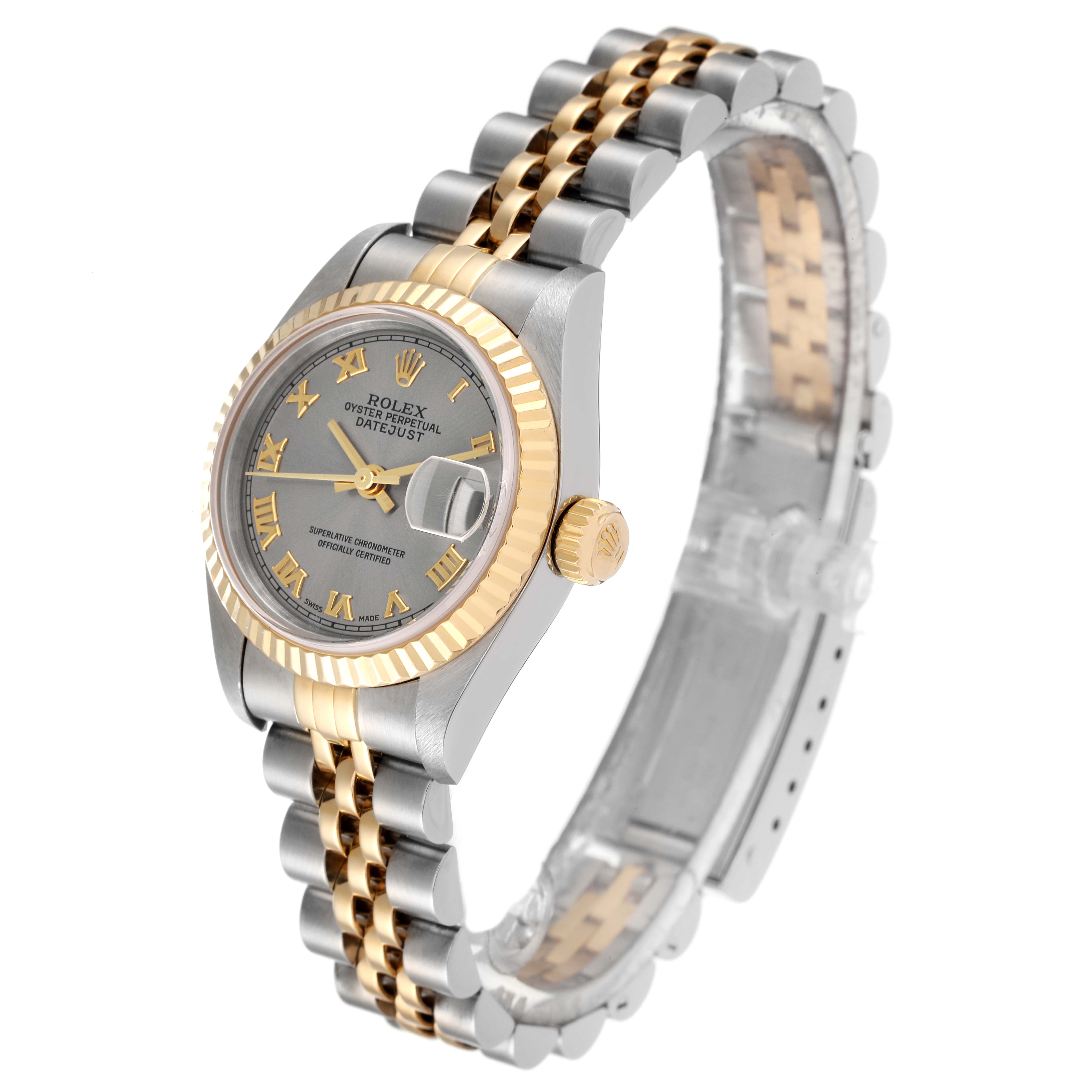 The image shows a Rolex Datejust 79173 Women
s Steel and Gold (two tone) Grey Dial 79173 Women
s Steel and Gold (two tone) Grey Dial watch at an angled side view, revealing the face, bezel, crown, and bracelet.