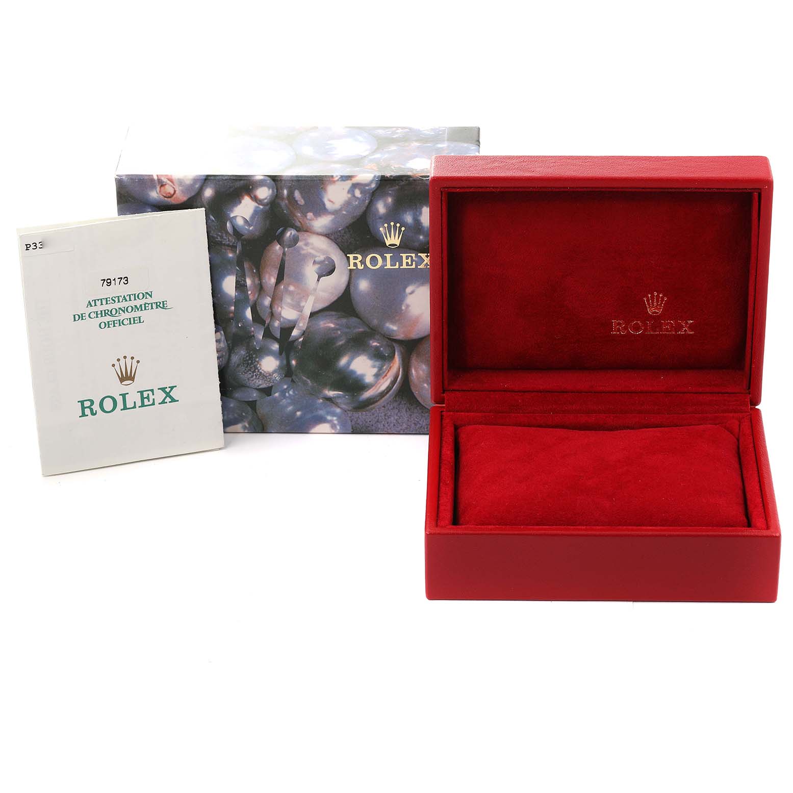 The image shows the packaging, manual, and an empty red display box for a Rolex Datejust 79173 Women
s Steel and Gold (two tone) Grey Dial 79173 Women
s Steel and Gold (two tone) Grey Dial watch.