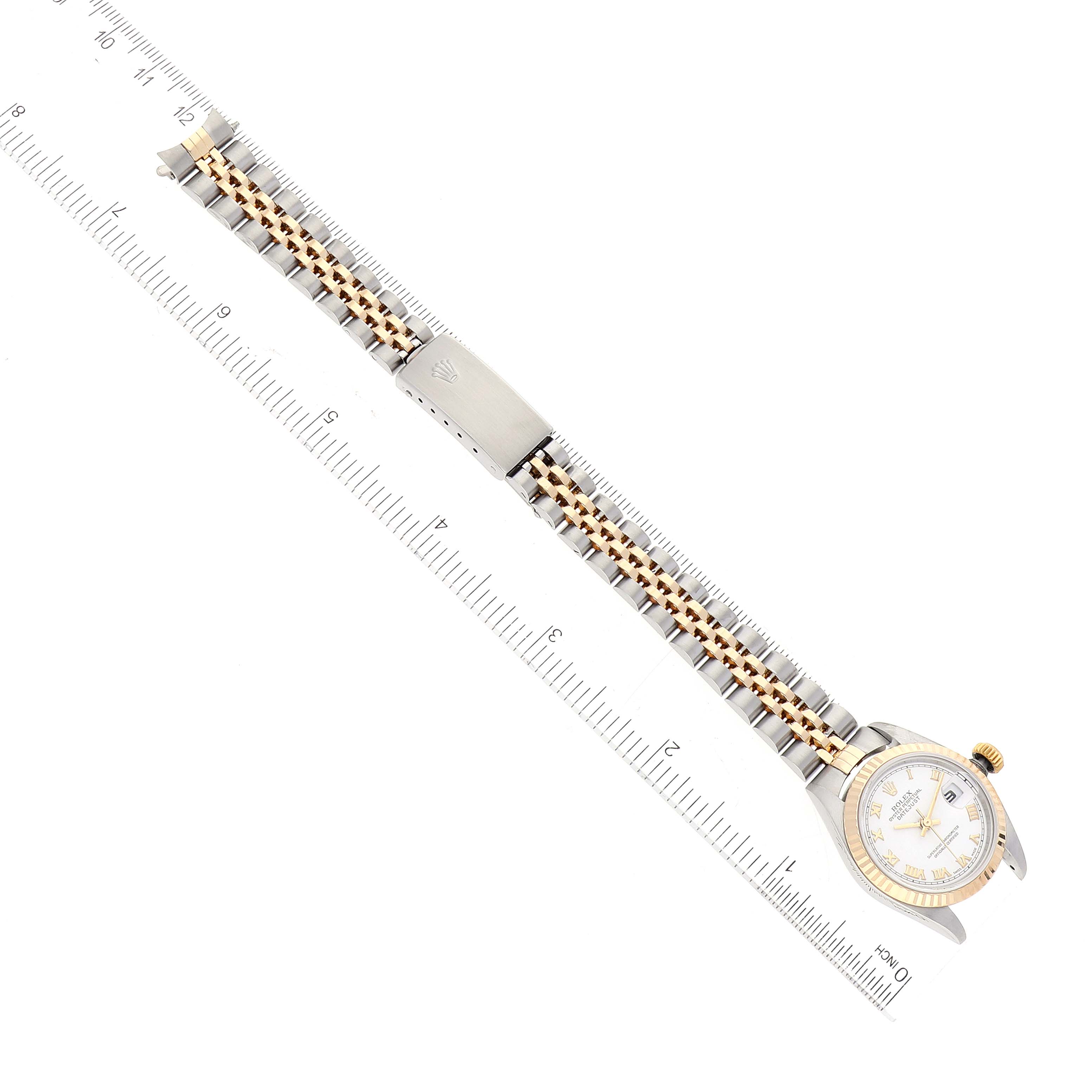 The image shows a top view of a Rolex Datejust 79173 Women's Steel and Gold (two tone) White Dial 79173 Women's Steel and Gold (two tone) White Dial watch, displaying its face and two-tone metal bracelet.