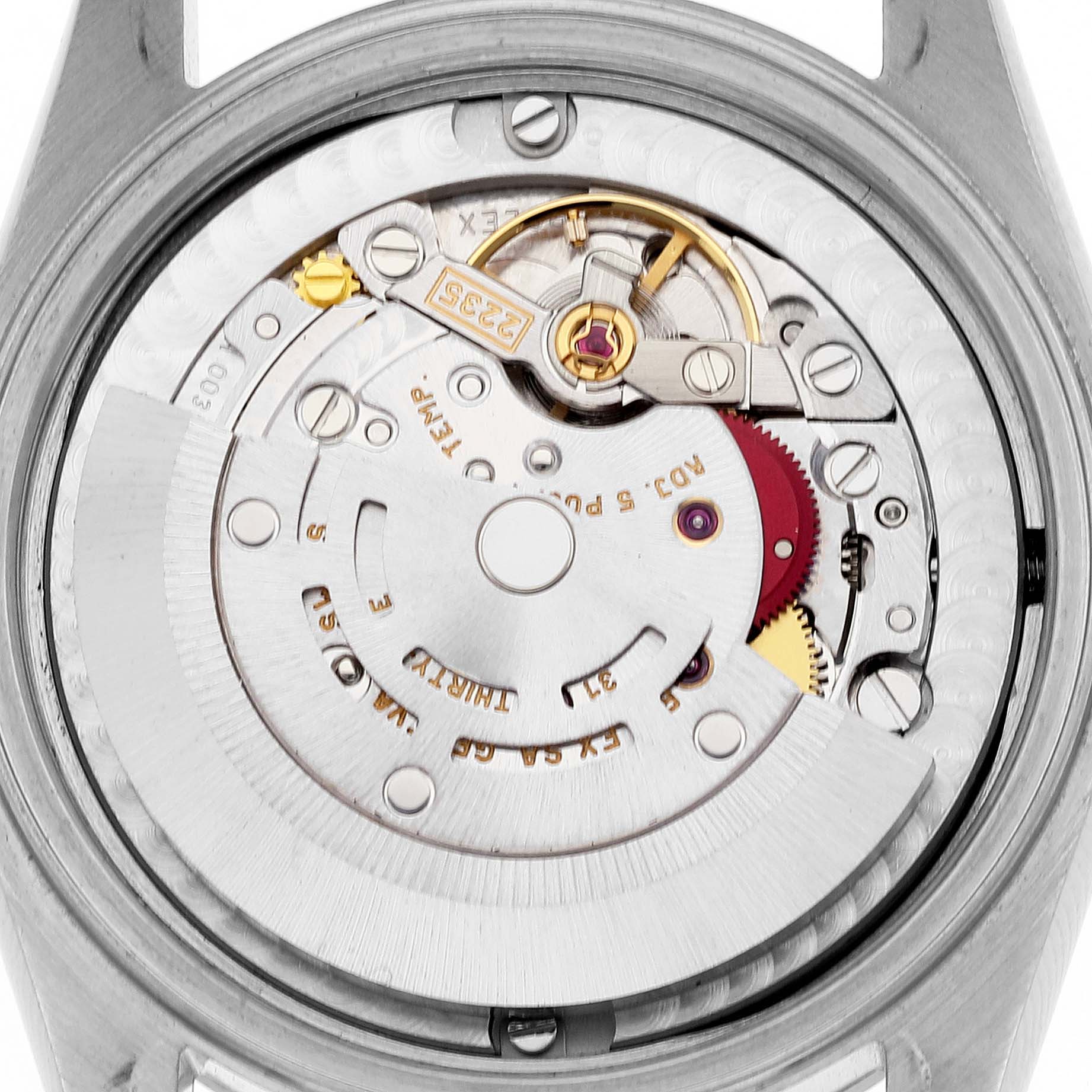 This image shows a close-up of the movement components of a Mid-Size Rolex watch, viewed from the back.