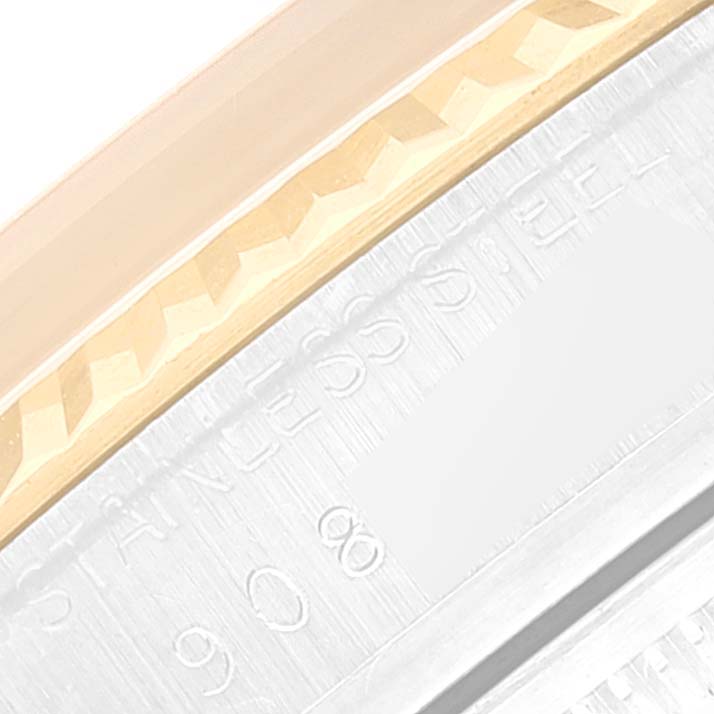 This image shows a close-up of the serrated edge and engraved numbers on a Rolex Vintage Collection 16013 Men
s Steel and Gold (two tone) Champagne Dial 16013 Men
s Steel and Gold (two tone) Champagne Dial watch.