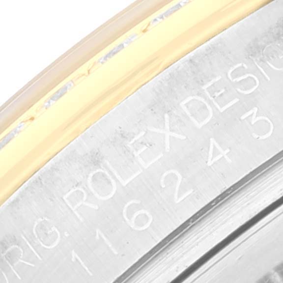 This image shows a close-up of the Rolex Datejust 116243 Men's Stainless Steel Silver Dial 116243 Men's Stainless Steel Silver Dial model, specifically highlighting the engravings on the case side.