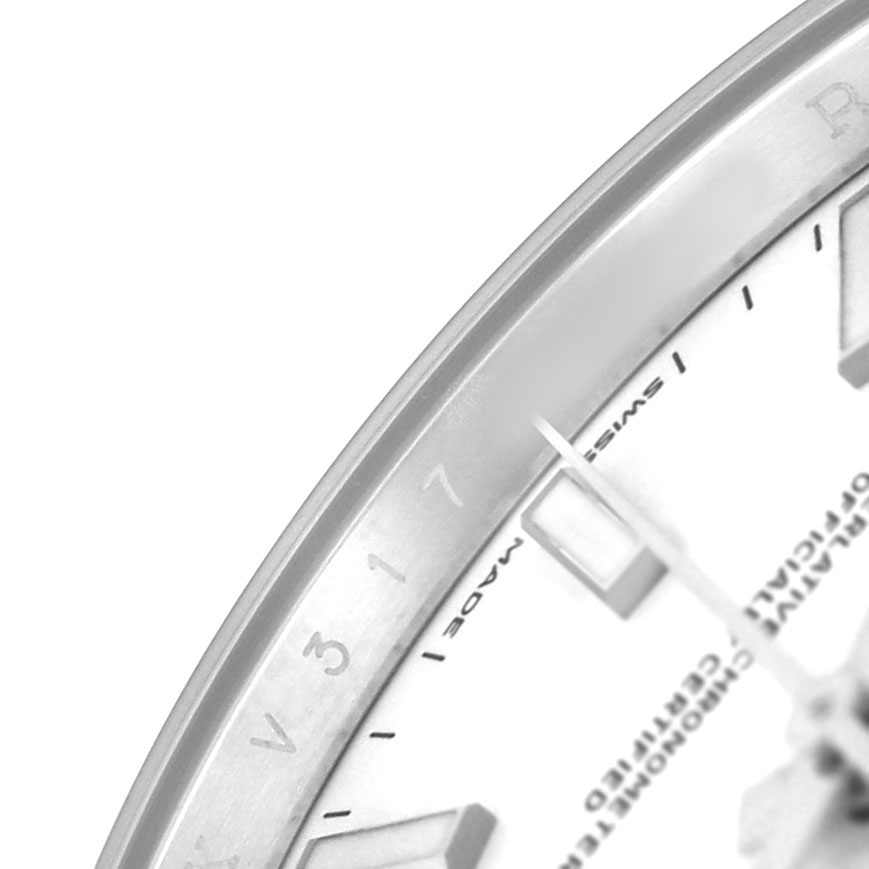 The image shows a close-up of the dial and bezel of a Rolex Datejust 41 126300 Men's Stainless Steel White Dial, focusing on markers and partial text.