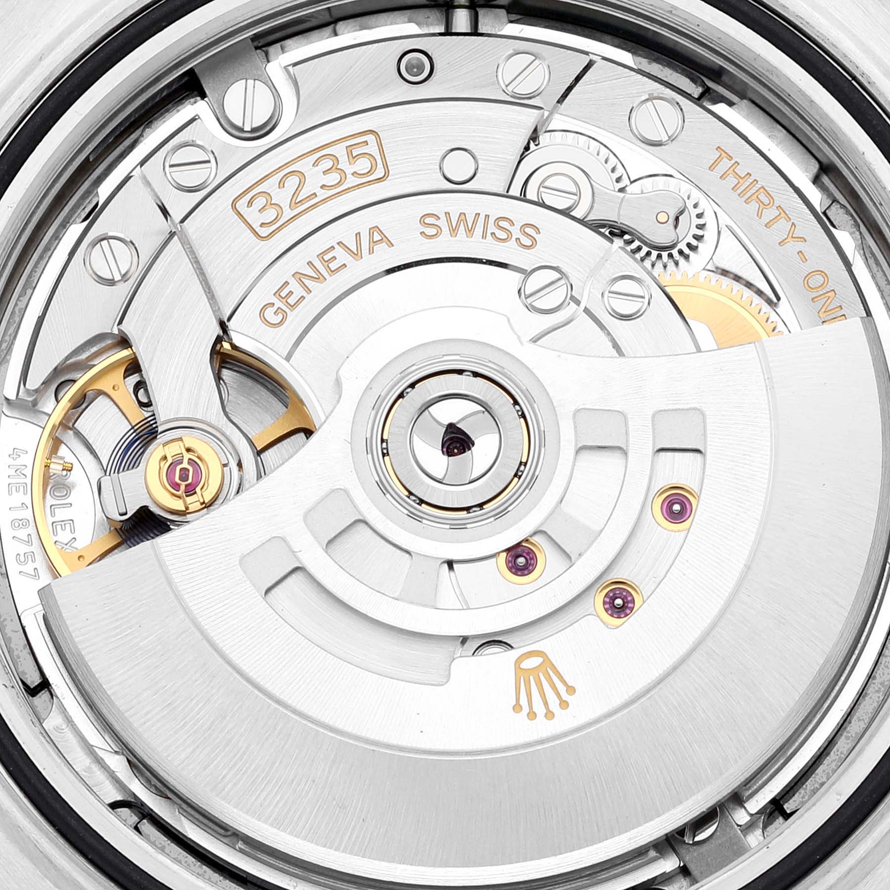 This is a close-up of the movement mechanism inside the Rolex Datejust 41 126334 Men
s Stainless Steel Blue Dial 126334 Men
s Stainless Steel Blue Dial watch, showcasing the intricate components and engravings.