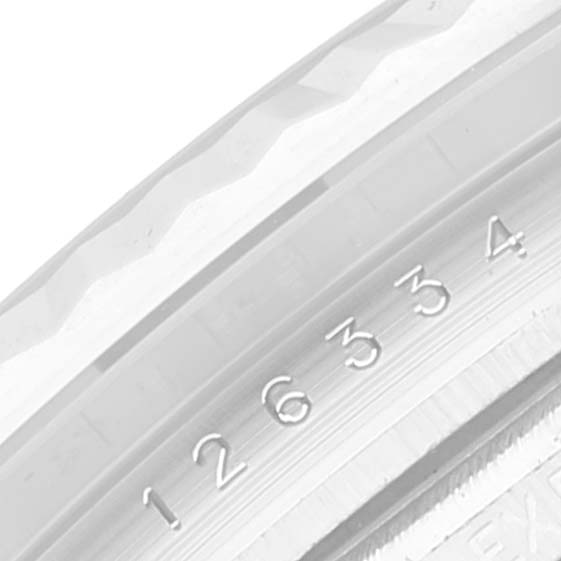 This image shows a close-up of the bezel with engraved serial numbers on a Rolex Datejust 41 126334 Men
s Stainless Steel Blue Dial 126334 Men
s Stainless Steel Blue Dial watch.