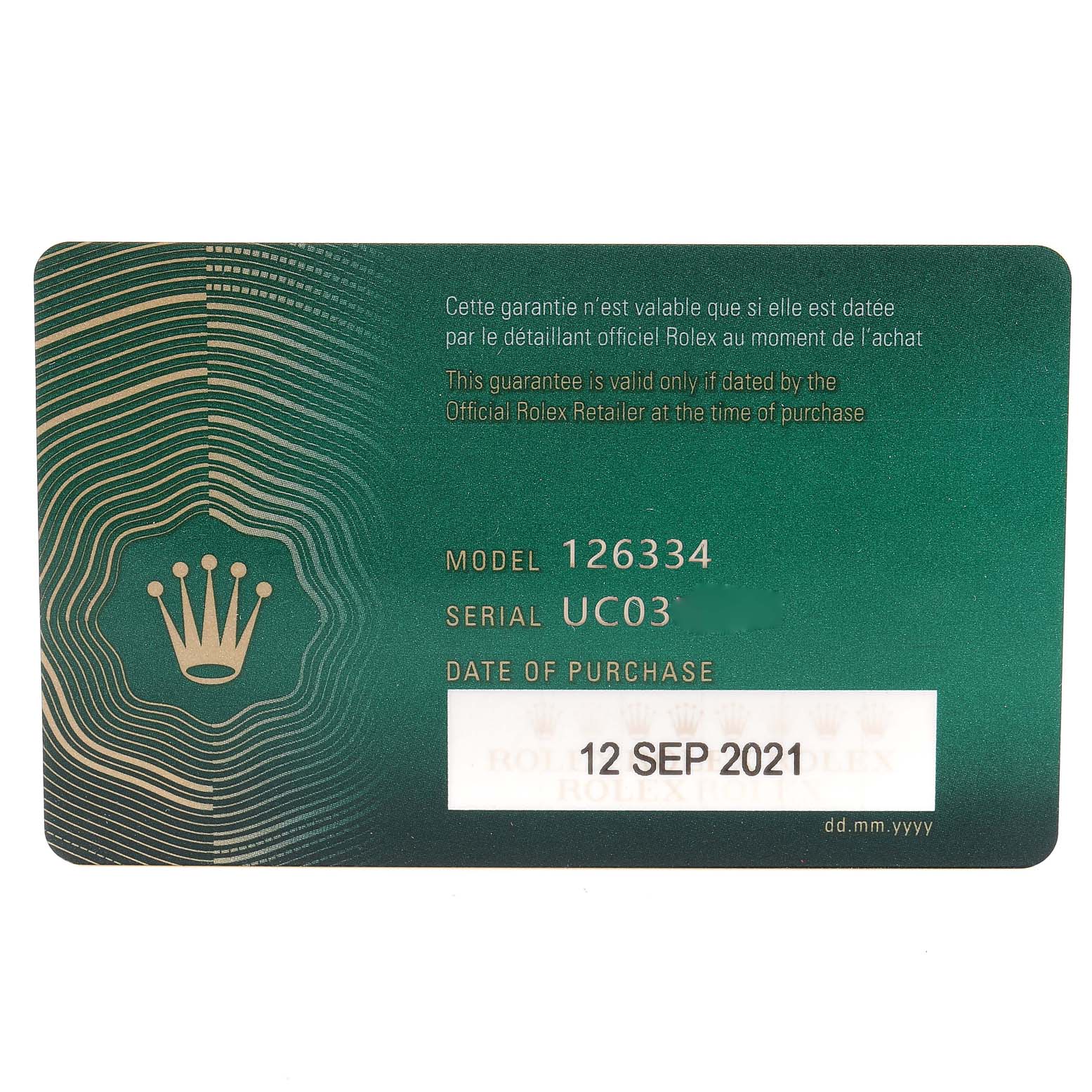 The image shows a green warranty card for the Rolex Datejust 41 126334 Men
s Stainless Steel Blue Dial 126334 Men
s Stainless Steel Blue Dial model 126334 with a purchase date of 12 Sept 2021.