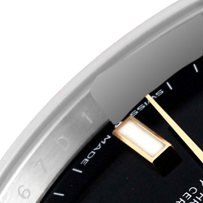 The image shows a close-up of the dial and part of the bezel of the Rolex Datejust 41 126333 Men's Steel and Gold (two tone) Black Dial 126333 Men's Steel and Gold (two tone) Black Dial watch.