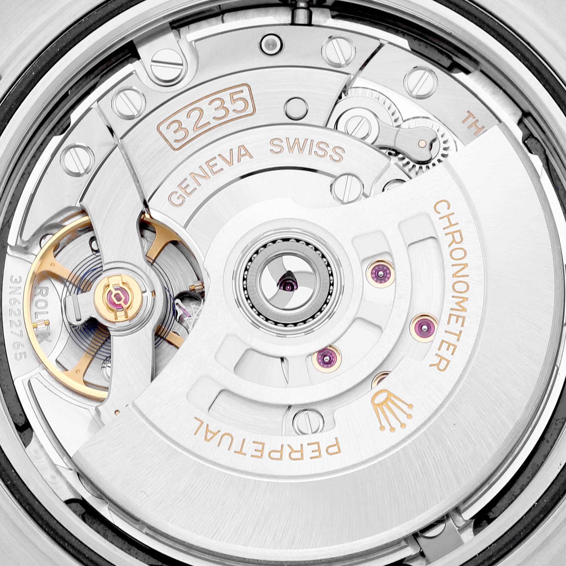 The image shows a close-up of the movement mechanism inside a Rolex Datejust 41 126333 Men's Steel and Gold (two tone) Black Dial 126333 Men's Steel and Gold (two tone) Black Dial watch.