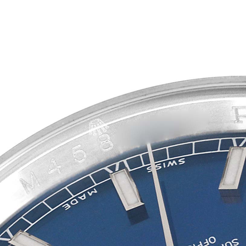 The image shows a close-up of the bezel, dial edge, and two hands of a Rolex Datejust 116200 Men's Stainless Steel Blue Dial 116200 Men's Stainless Steel Blue Dial watch.