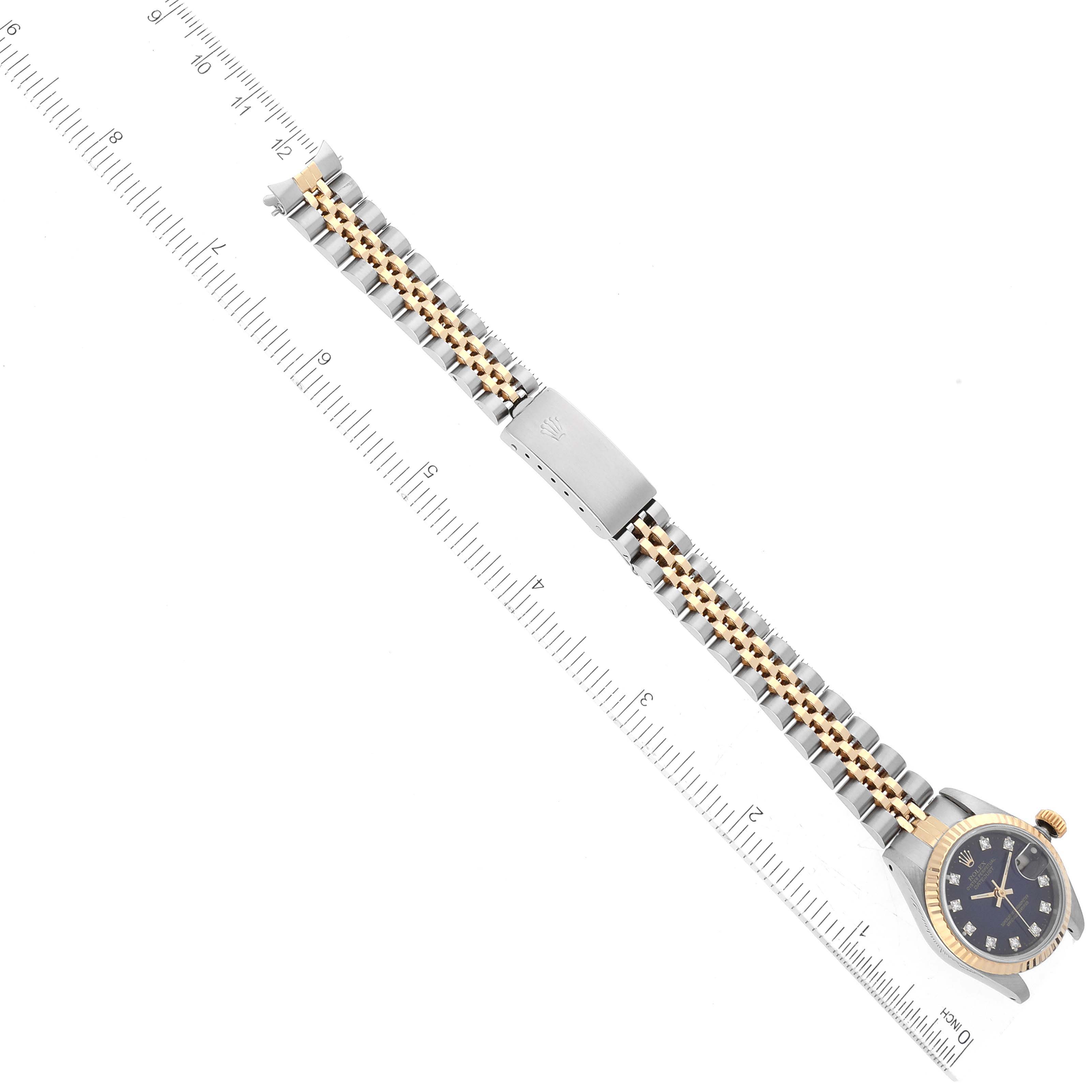 This image shows a top view of the Rolex Datejust 69173 Women's Steel and Gold (two tone) Blue Dial 69173 Women's Steel and Gold (two tone) Blue Dial watch, featuring the face, bezel, band, and clasp.