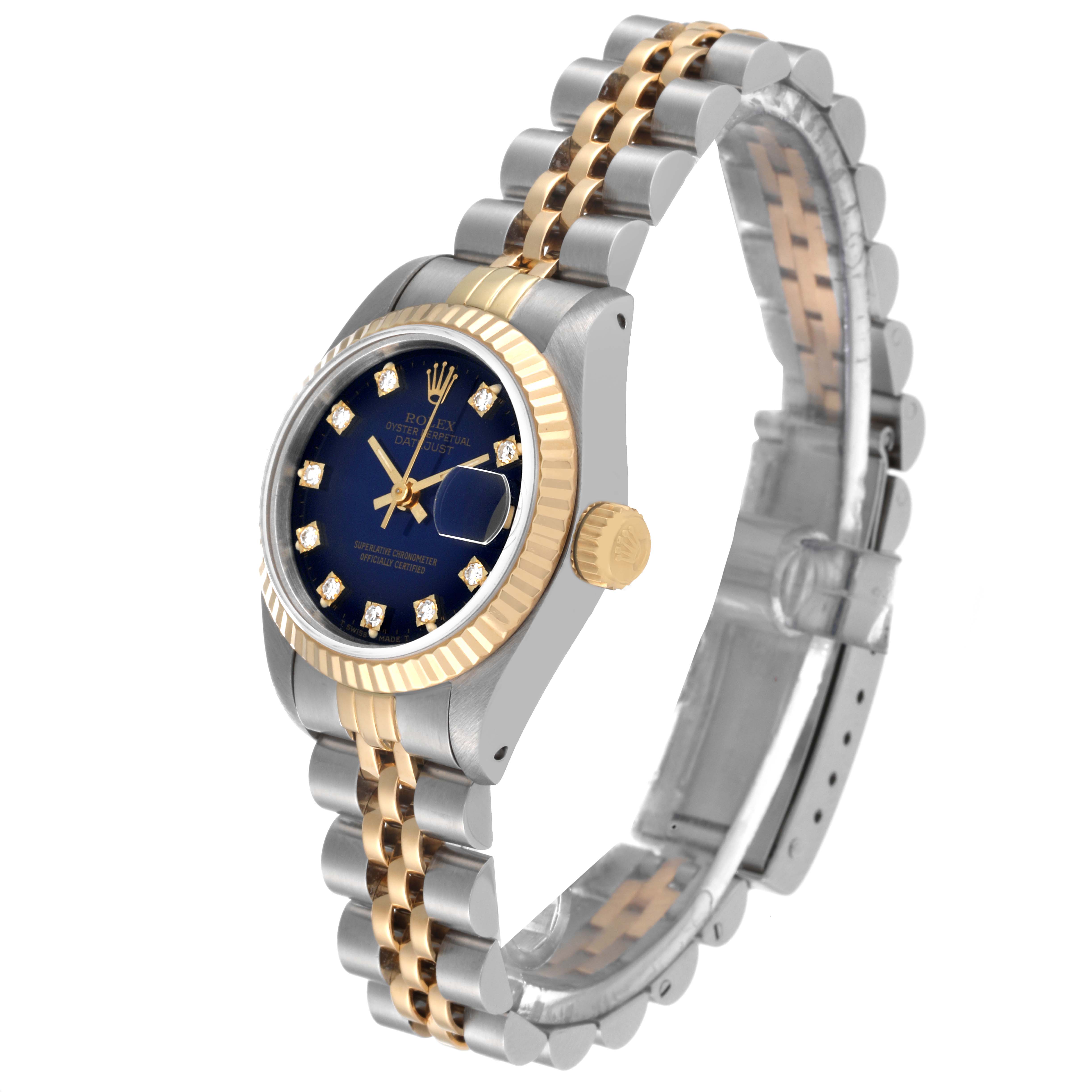 The image shows a Rolex Datejust 69173 Women's Steel and Gold (two tone) Blue Dial 69173 Women's Steel and Gold (two tone) Blue Dial watch at an angle highlighting its bracelet, dial, bezel, and crown.