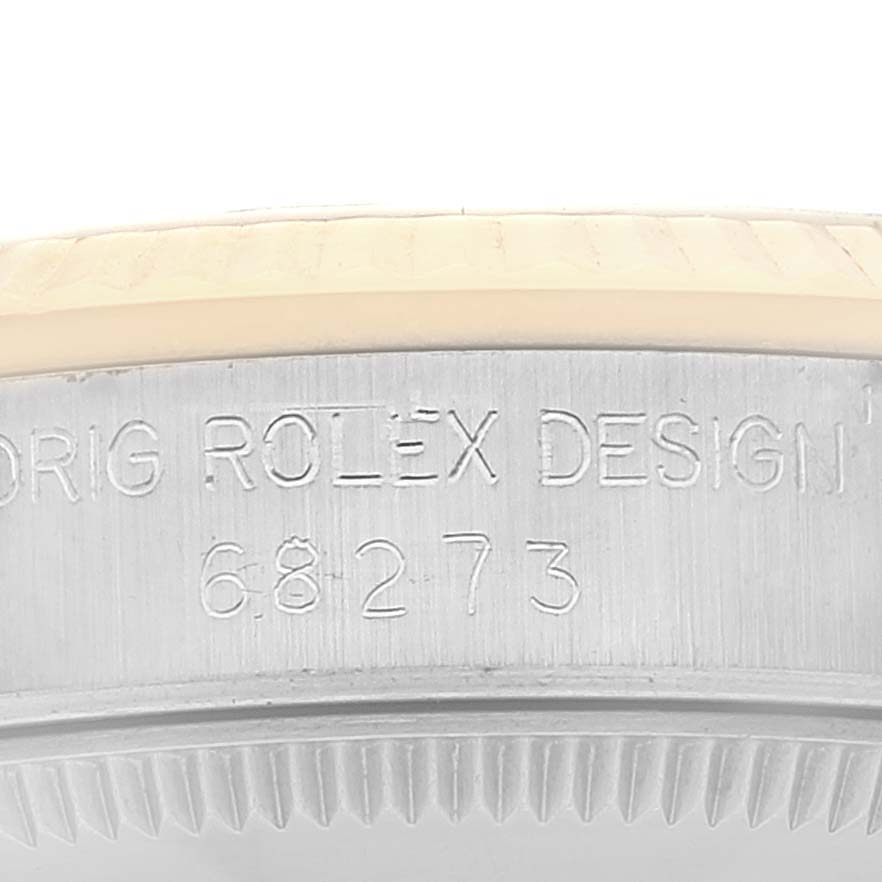 The image shows the engraved side of the bezel and case of a Mid-Size Rolex watch, displaying the model number 68273.