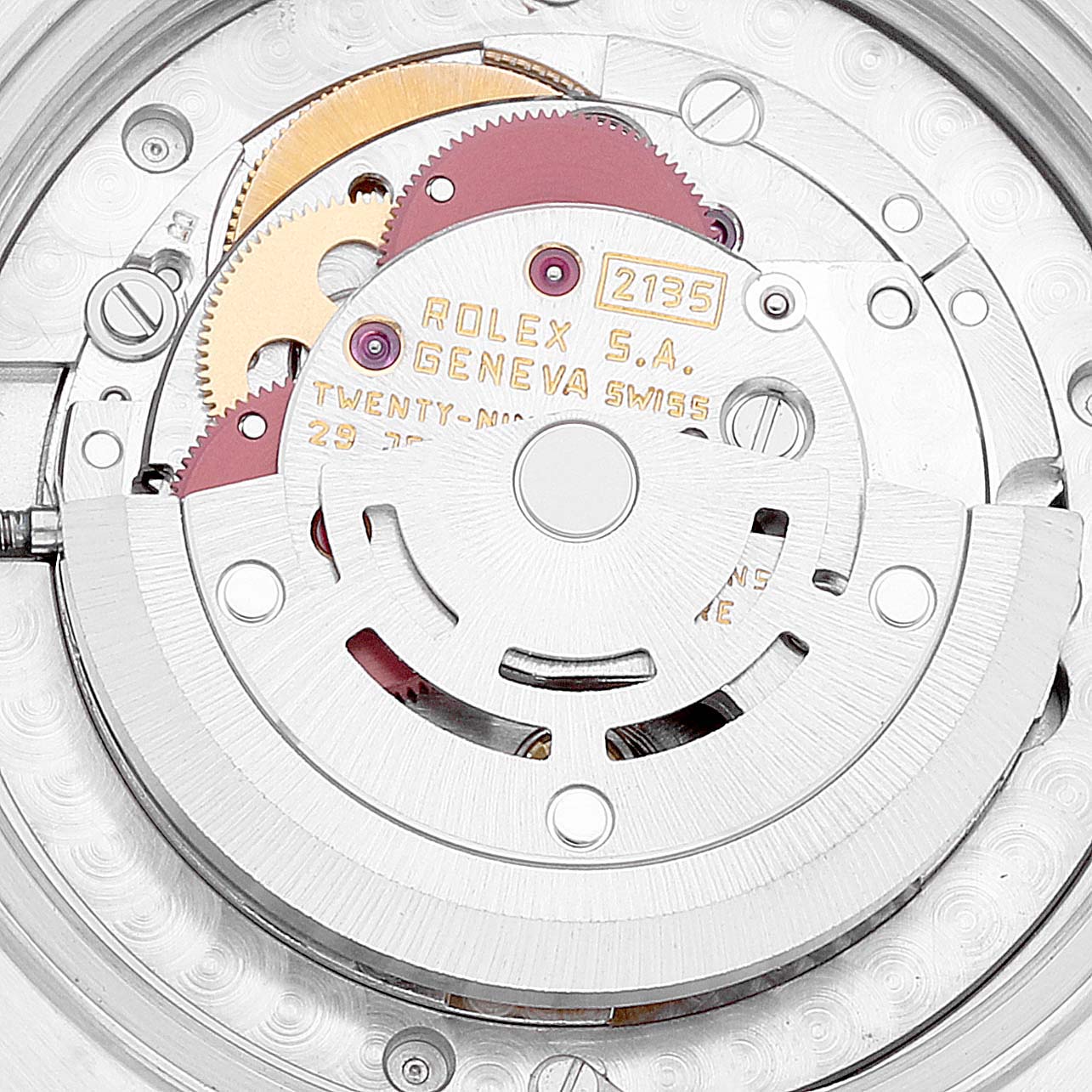This image shows the intricate inner mechanism of a Rolex Mid-Size 68273 Women
s Steel and Gold (two tone) Black Dial 68273 Women
s Steel and Gold (two tone) Black Dial model watch, specifically the Rolex 2135 movement.