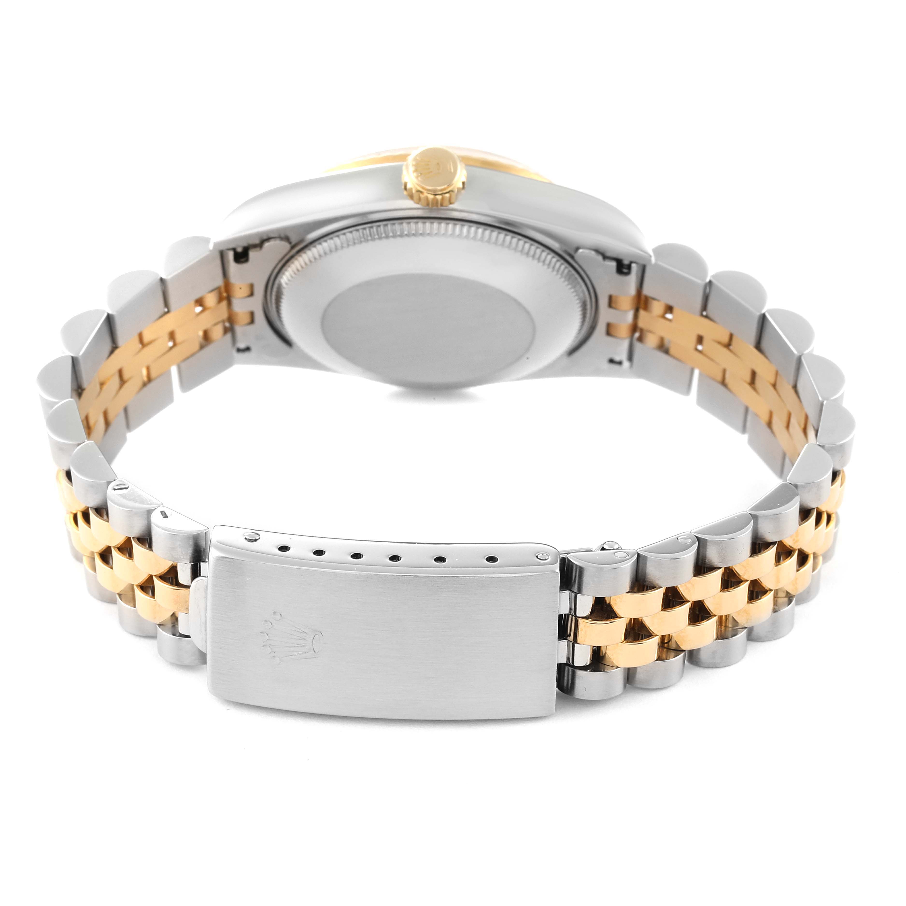The image shows the back view of a Rolex Mid-Size 68273 Women
s Steel and Gold (two tone) Champagne Dial 68273 Women
s Steel and Gold (two tone) Champagne Dial model watch, focusing on the bracelet and clasp.