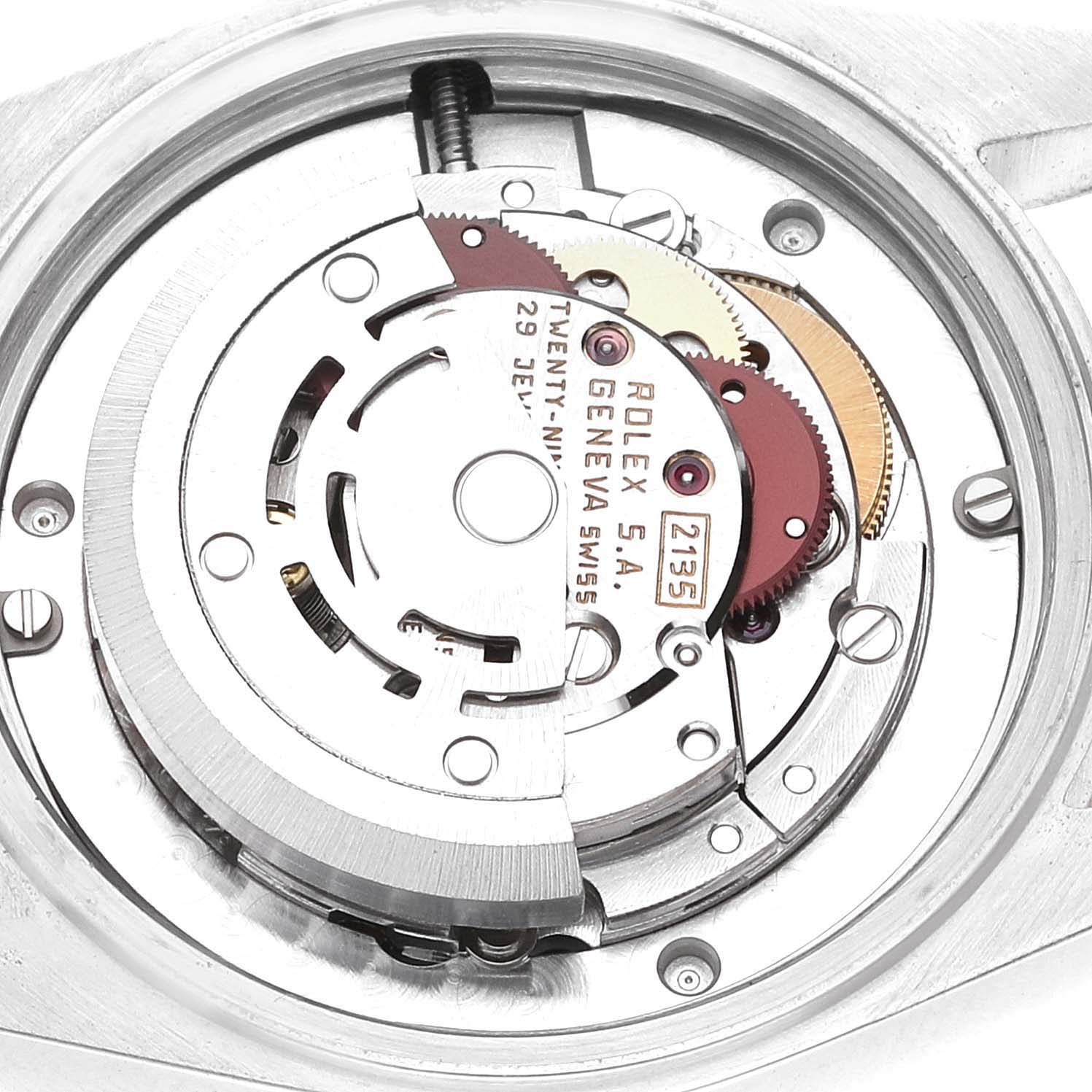The image shows an internal view of the movement mechanism of a Mid-Size Rolex watch model.