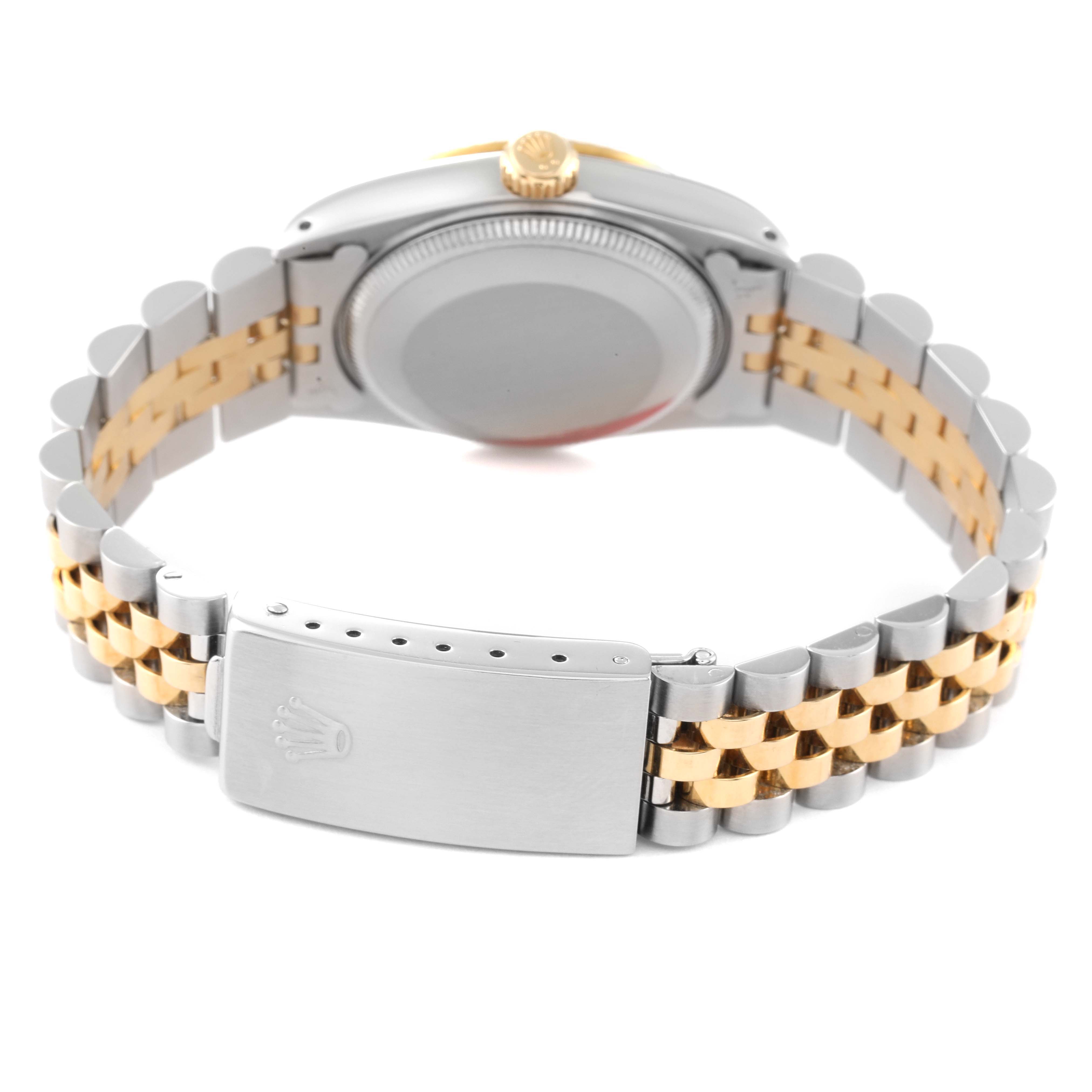 The image shows the back view of a Rolex Mid-Size 68273 Women
s Steel and Gold (two tone) Champagne Dial 68273 Women
s Steel and Gold (two tone) Champagne Dial model watch featuring its bracelet and clasp.