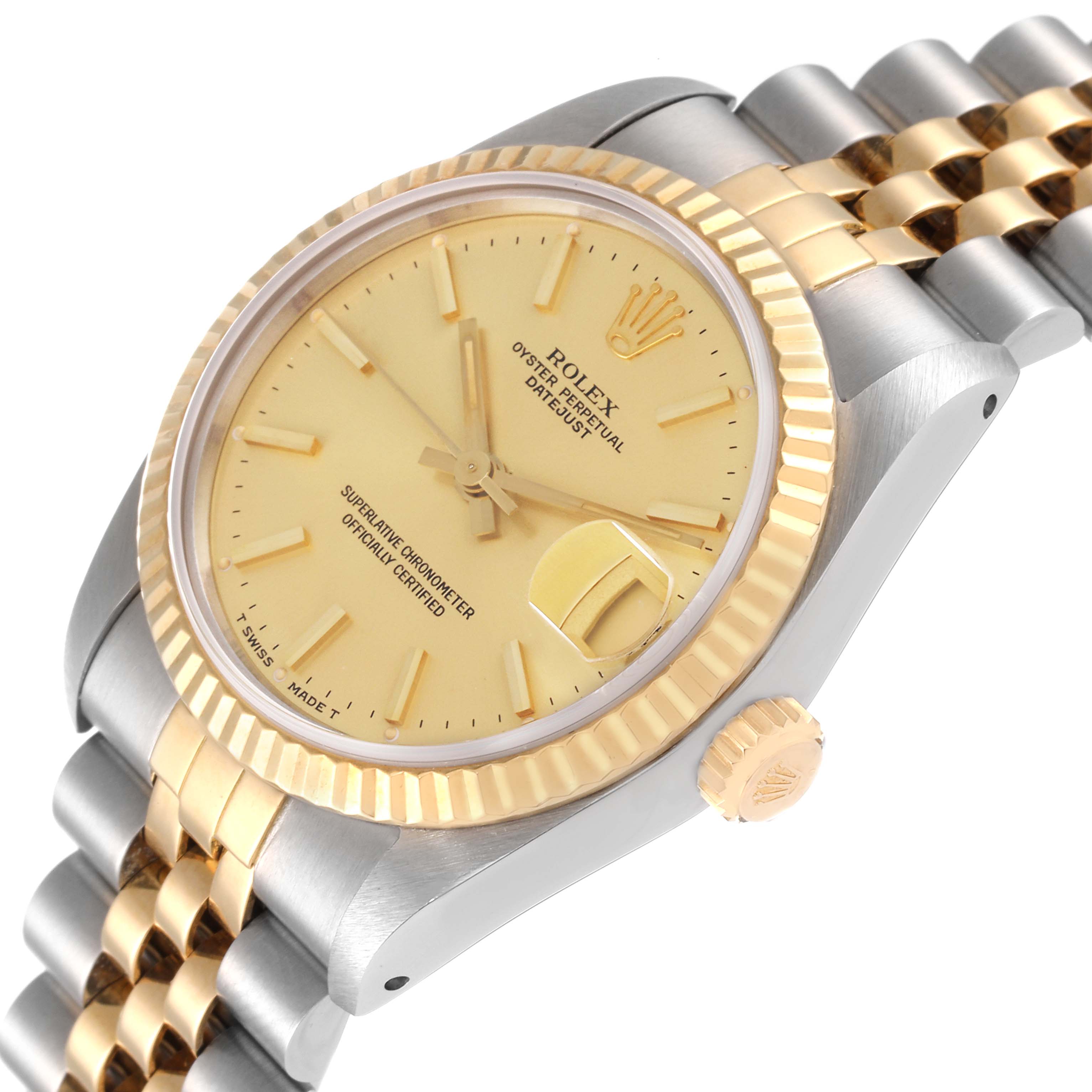 The Rolex Mid-Size 68273 Women
s Steel and Gold (two tone) Champagne Dial 68273 Women
s Steel and Gold (two tone) Champagne Dial watch is shown at a slight angle displaying its gold bezel, dial, and dual-tone bracelet.