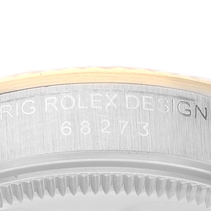 This image shows the engraved side of a Mid-Size Rolex watch case, specifically the model number 68273.