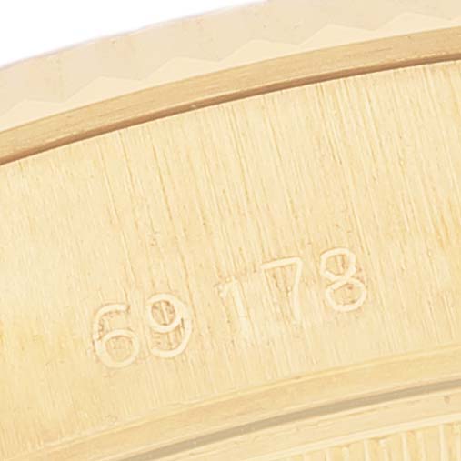 The image shows a close-up view of the outer edge of the Rolex President 69178 Women's Yellow Gold White Dial 69178 Women's Yellow Gold White Dial model, displaying the engraved model number "69178".