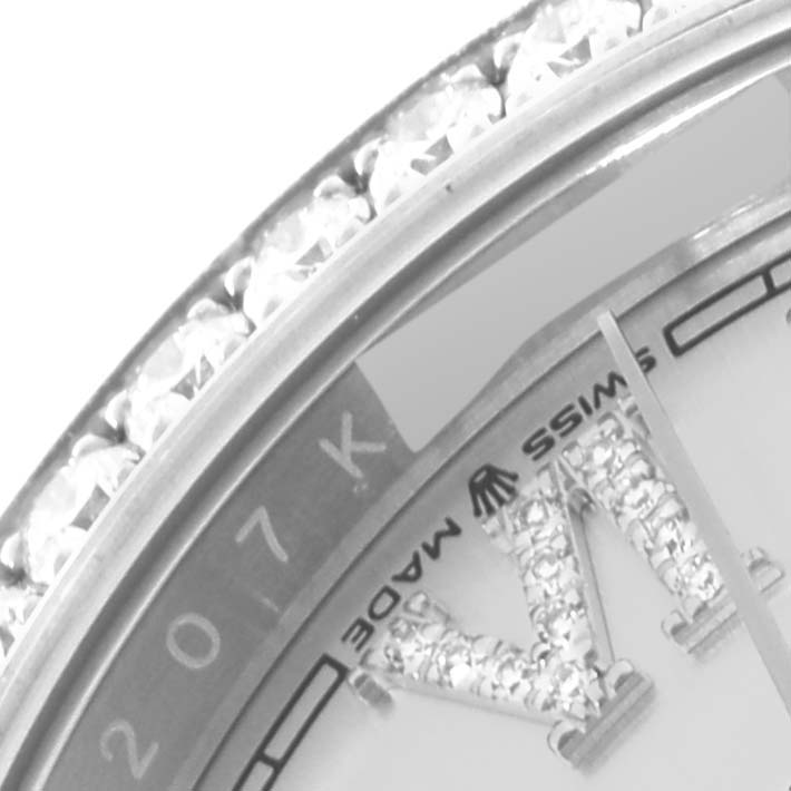 The image shows a close-up of the bezel and part of the dial with diamonds on a Rolex Datejust 126284 Men's Stainless Steel Silver Dial 126284 Men's Stainless Steel Silver Dial watch.