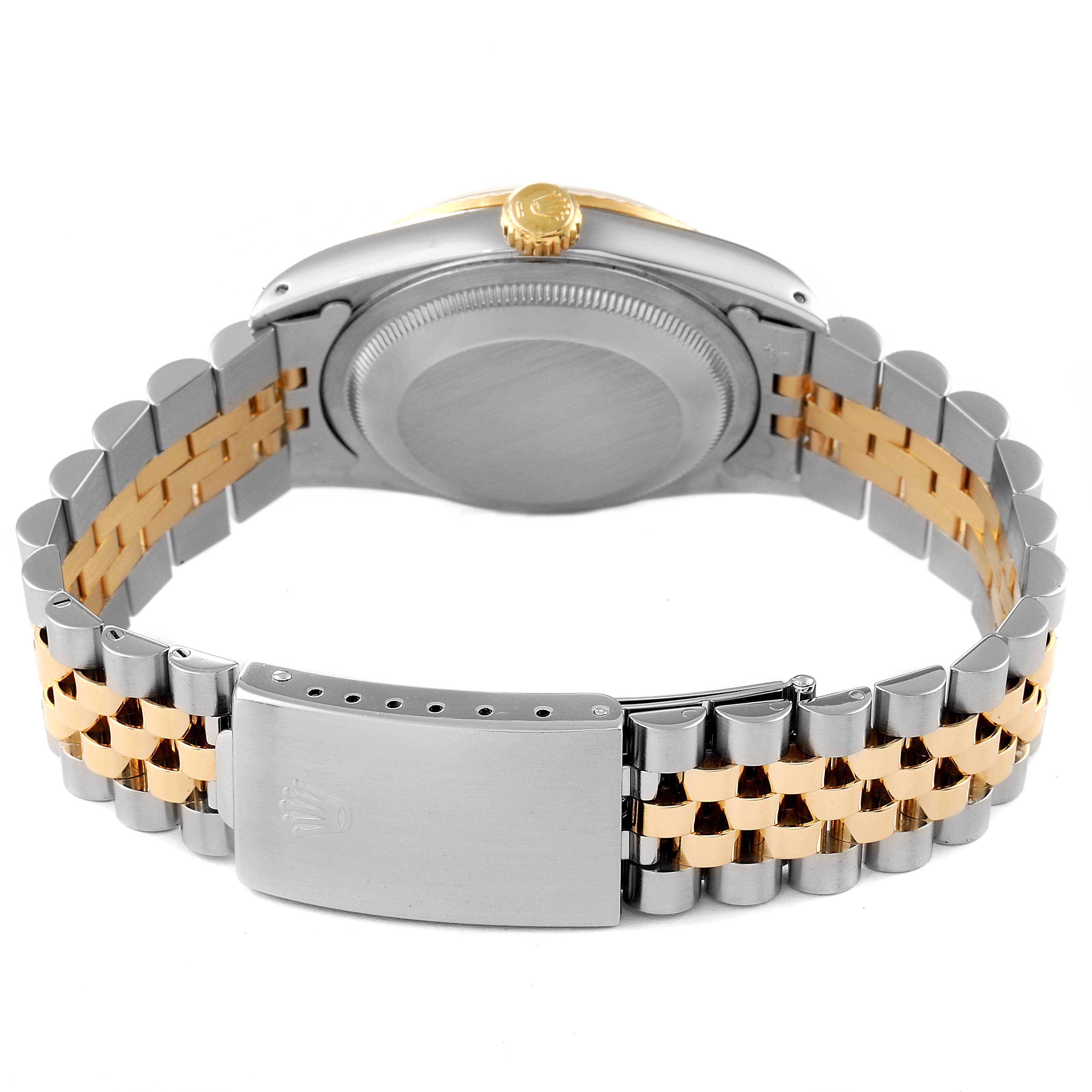 The image shows the back view of a Rolex Datejust 16233 Men's Steel and Gold (two tone) Champagne Dial 16233 Men's Steel and Gold (two tone) Champagne Dial watch, highlighting the bracelet and clasp.