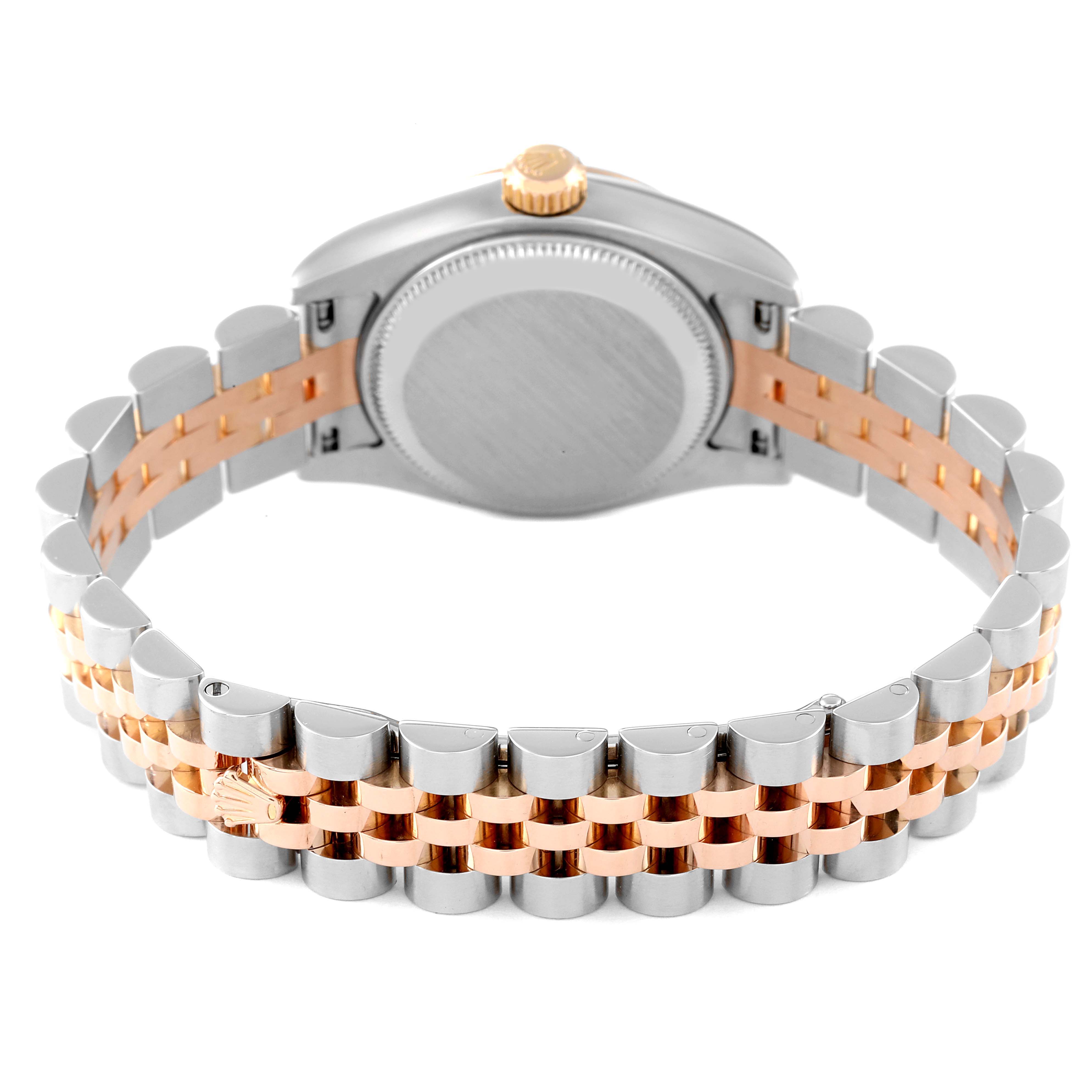 The image shows the back view of a Rolex Datejust 179171 Women's Steel and Gold (two tone) Pink Dial 179171 Women's Steel and Gold (two tone) Pink Dial, highlighting the case back and two-tone bracelet with a gold crown logo.