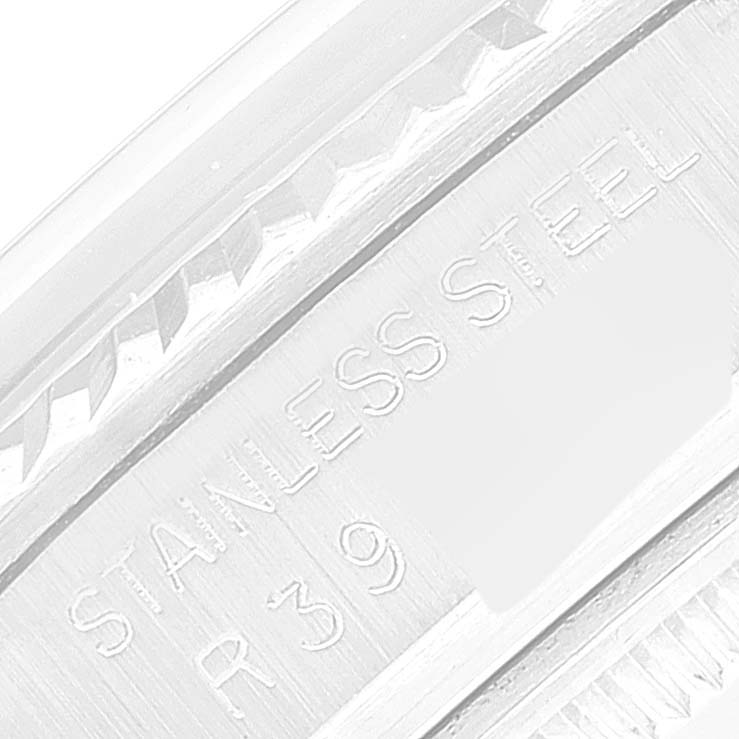 This image shows a close-up of the side engraving on a Rolex Vintage Collection 16014 Men
s Stainless Steel Silver Dial 16014 Men
s Stainless Steel Silver Dial model, highlighting the "STAINLESS STEEL" mark.