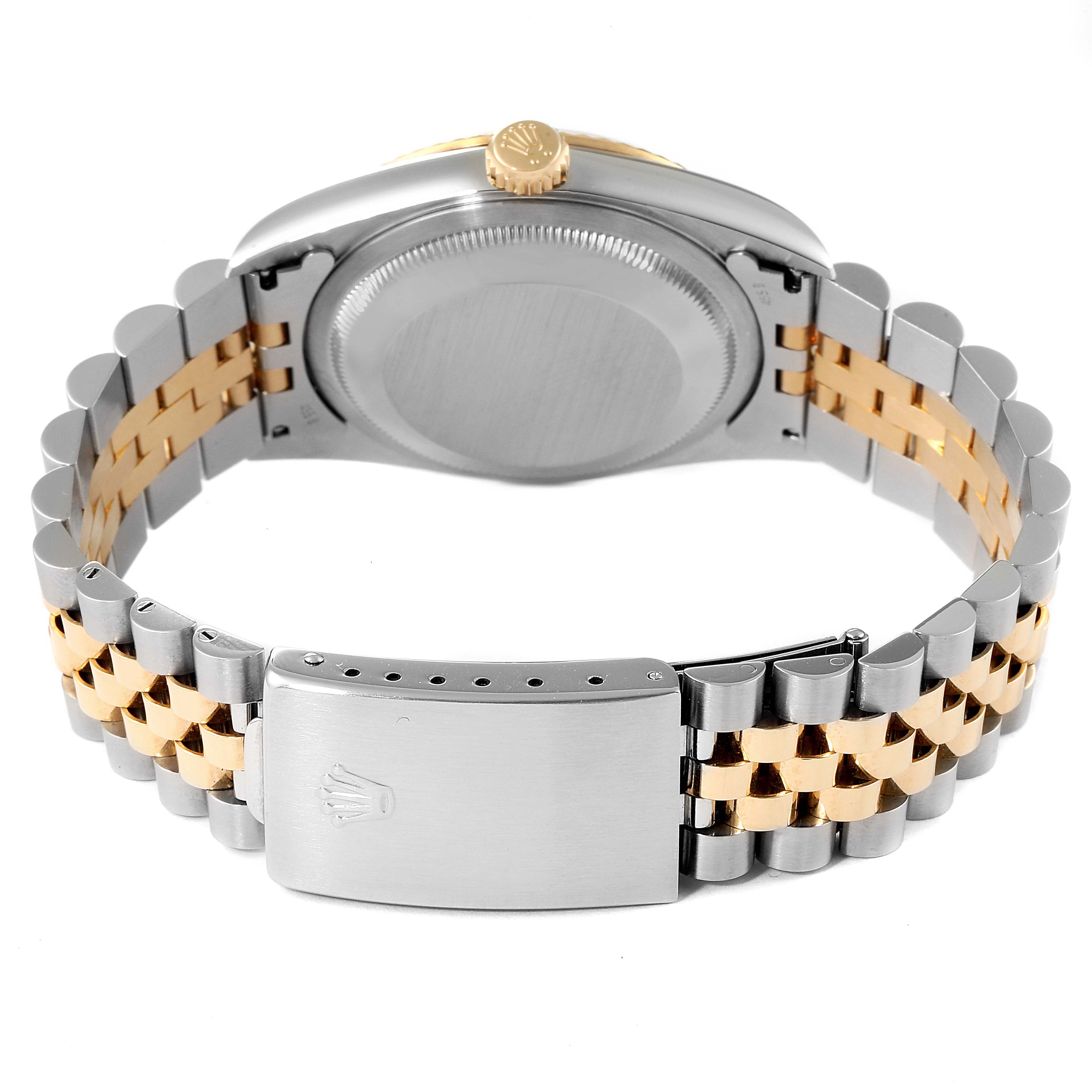 The image shows the back case, crown, and two-tone bracelet with clasp of a Rolex Datejust 16233 Men's Steel and Gold (two tone) Champagne Dial 16233 Men's Steel and Gold (two tone) Champagne Dial watch.